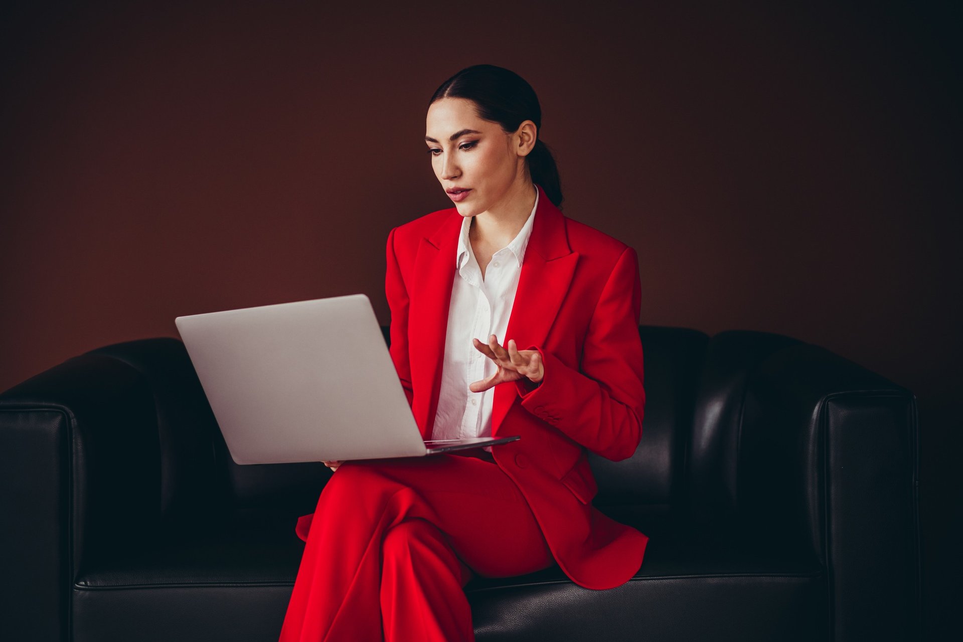 black and brown leather padded tub sofa