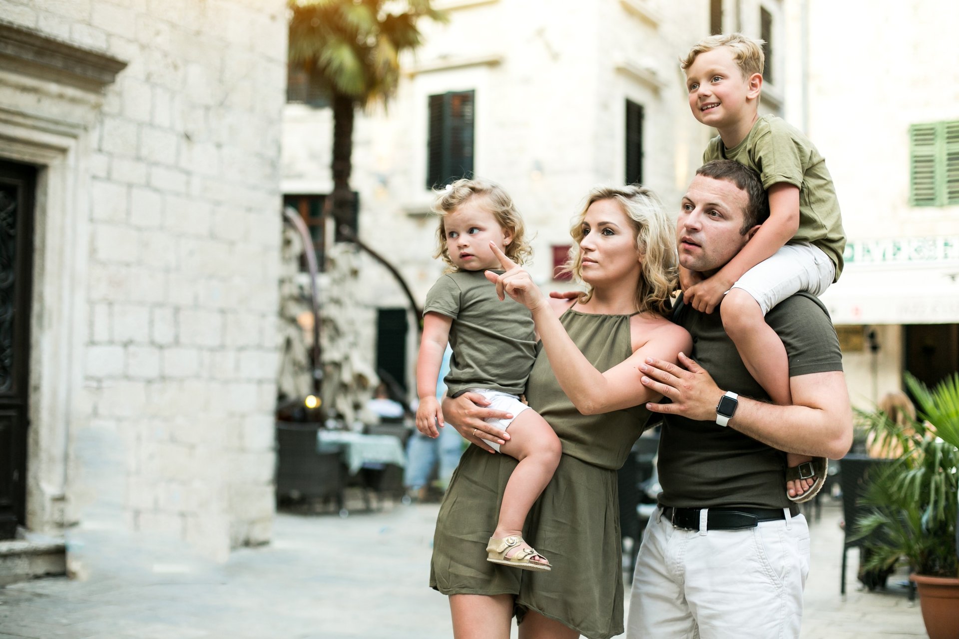 an abstract photo of a curved building with a blue sky in the background