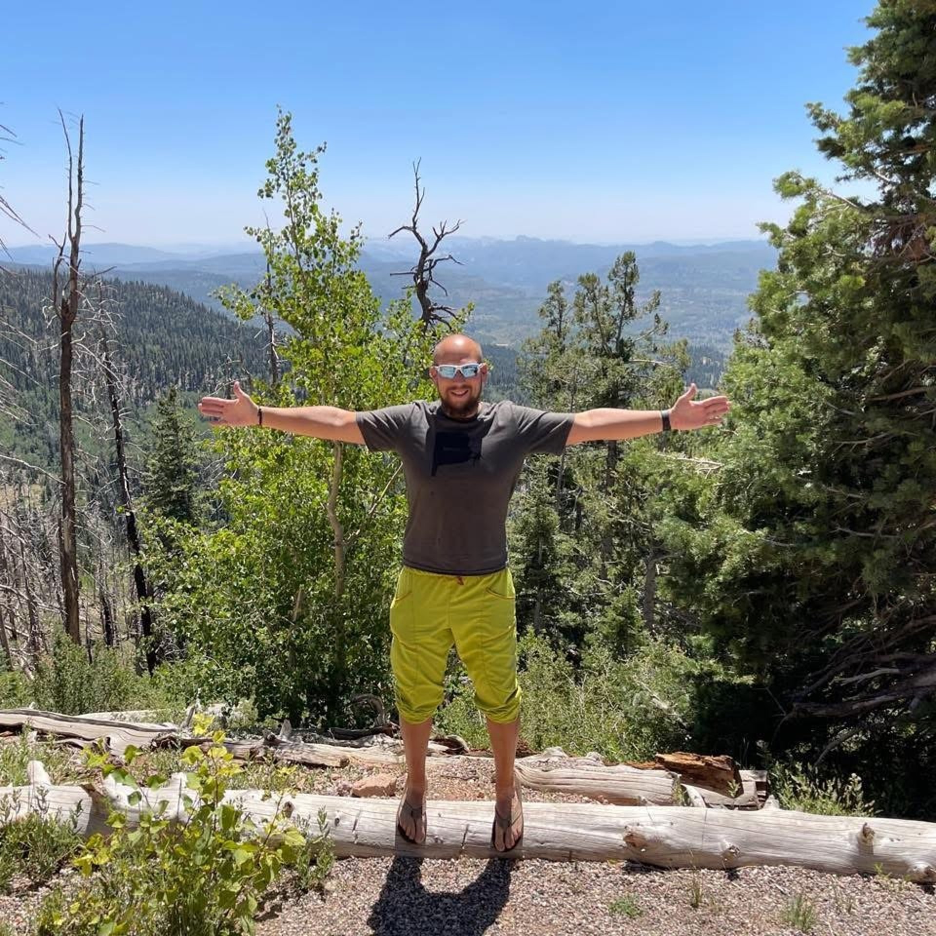 an abstract photo of a curved building with a blue sky in the background