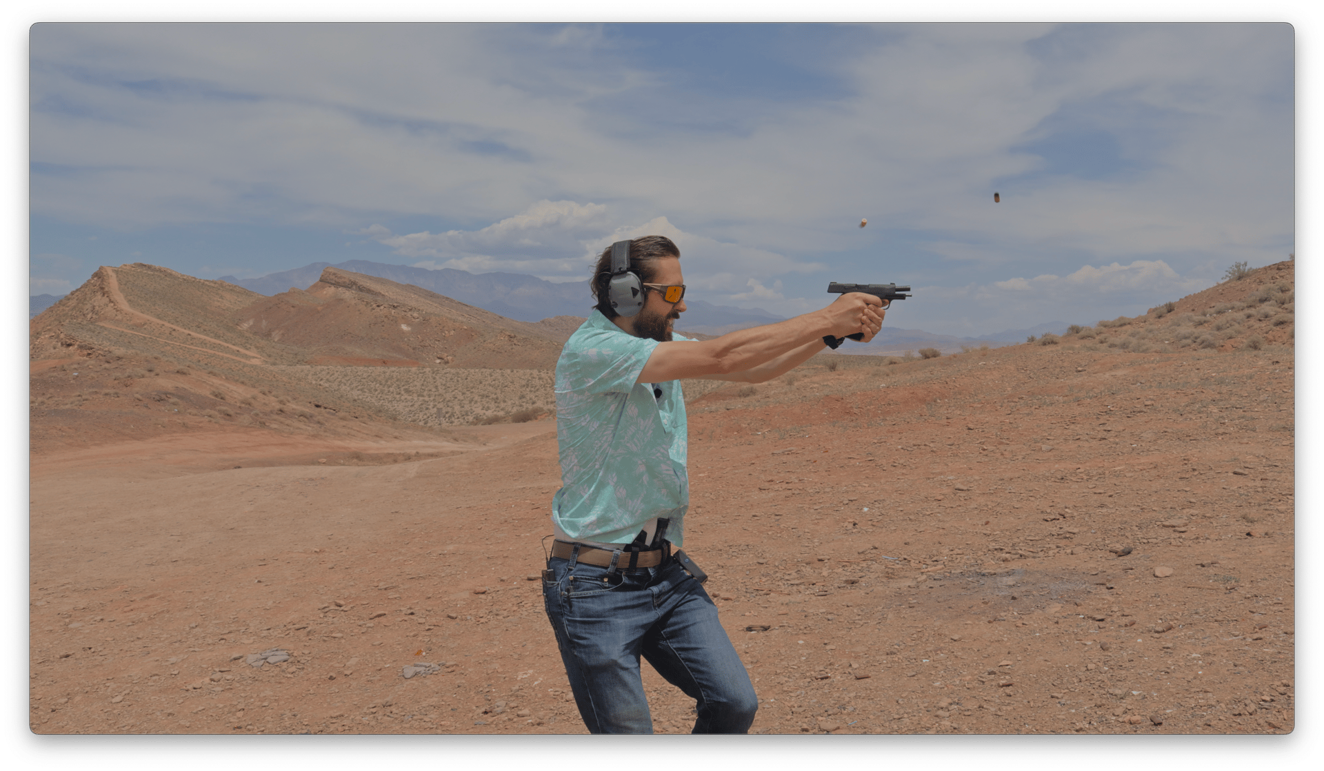 an abstract photo of a curved building with a blue sky in the background