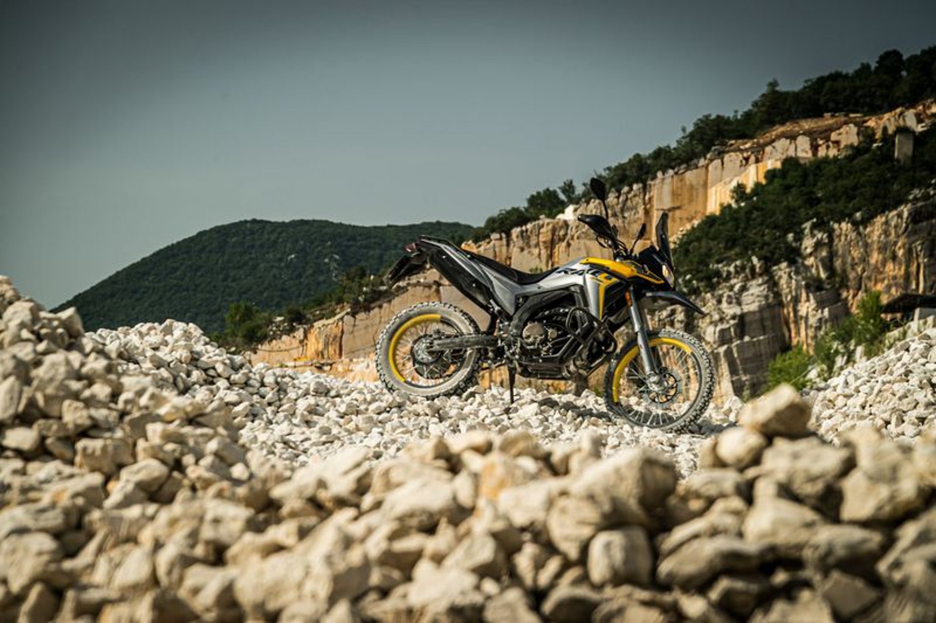 an abstract photo of a curved building with a blue sky in the background