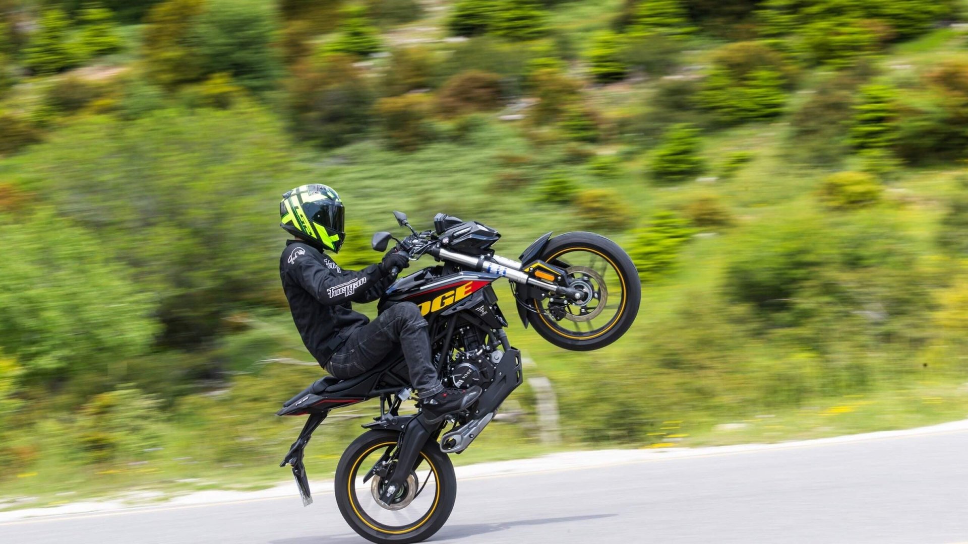 an abstract photo of a curved building with a blue sky in the background