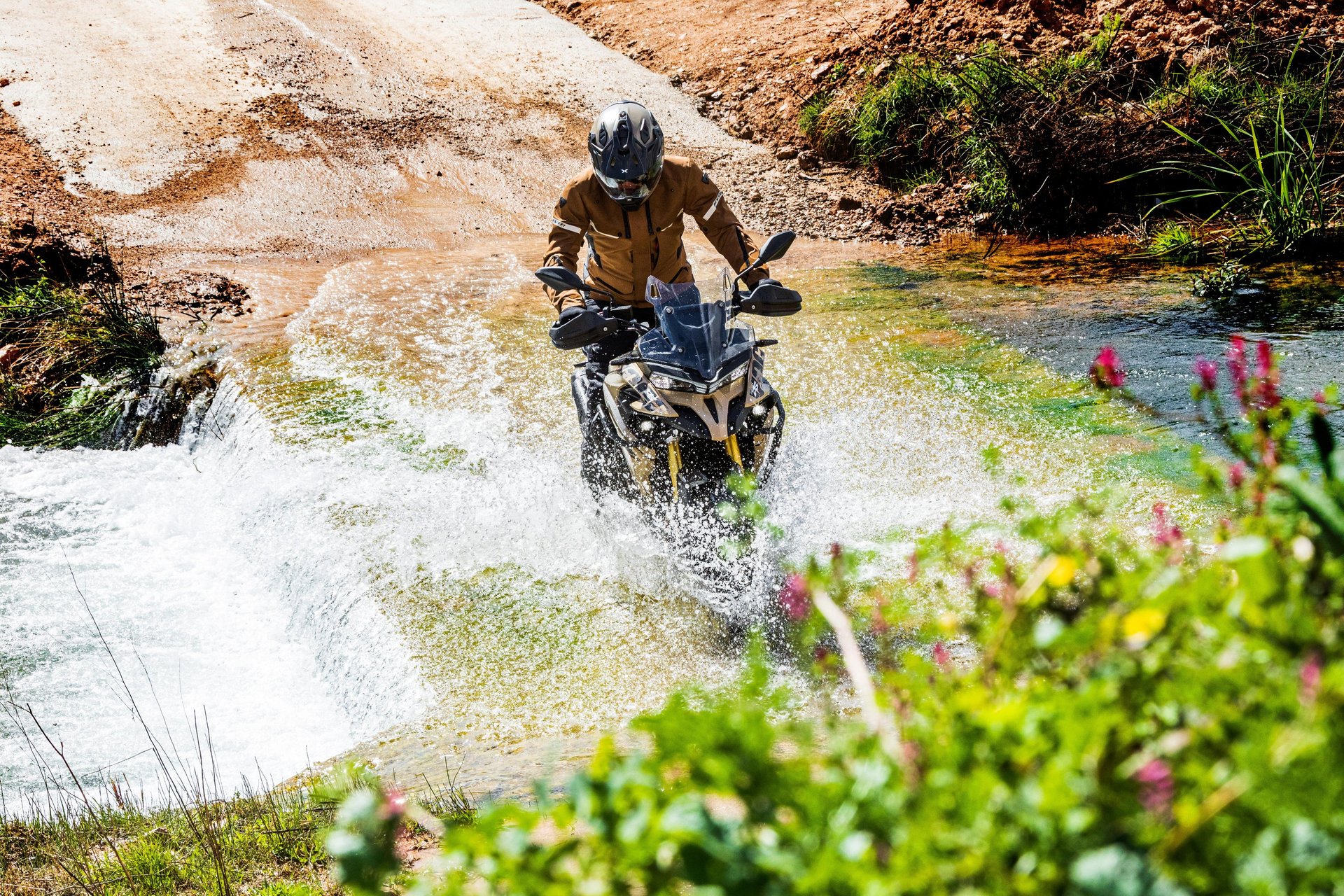 an abstract photo of a curved building with a blue sky in the background