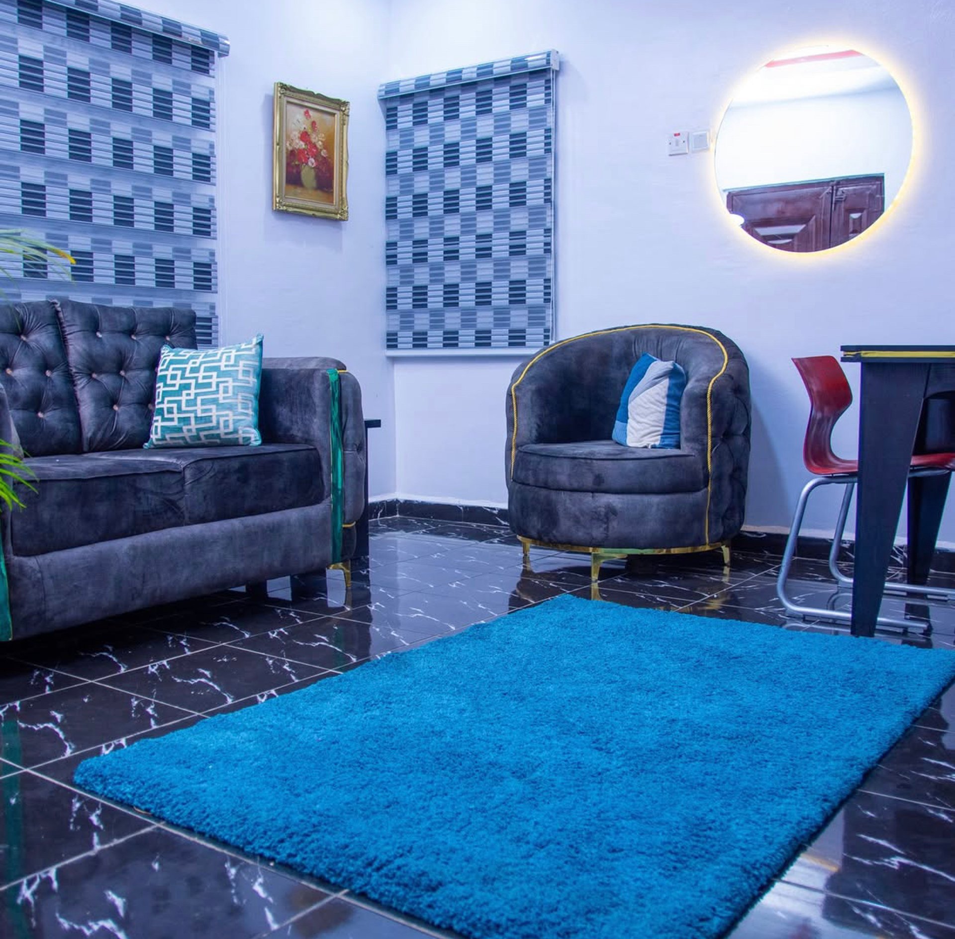 black and brown leather padded tub sofa