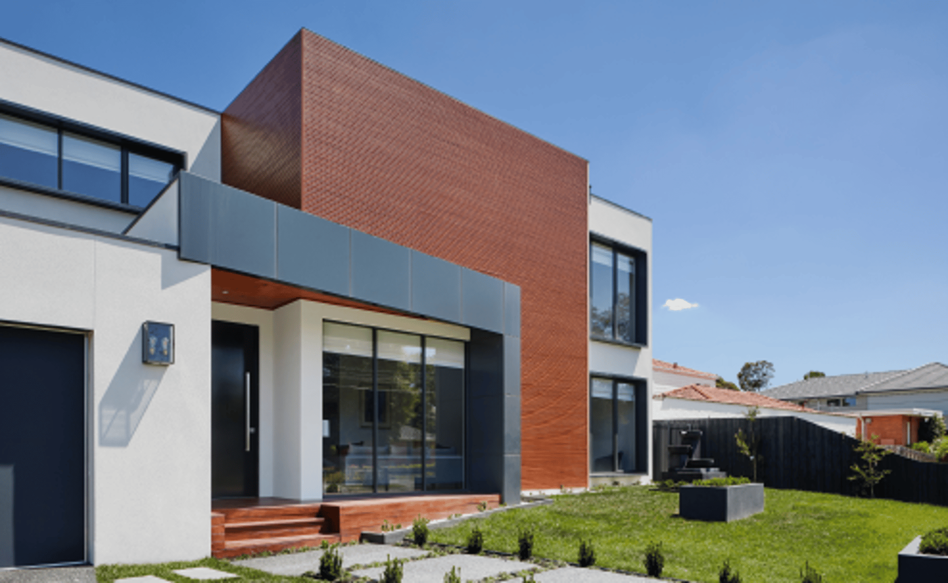 a close up of a black and brown abstract painting