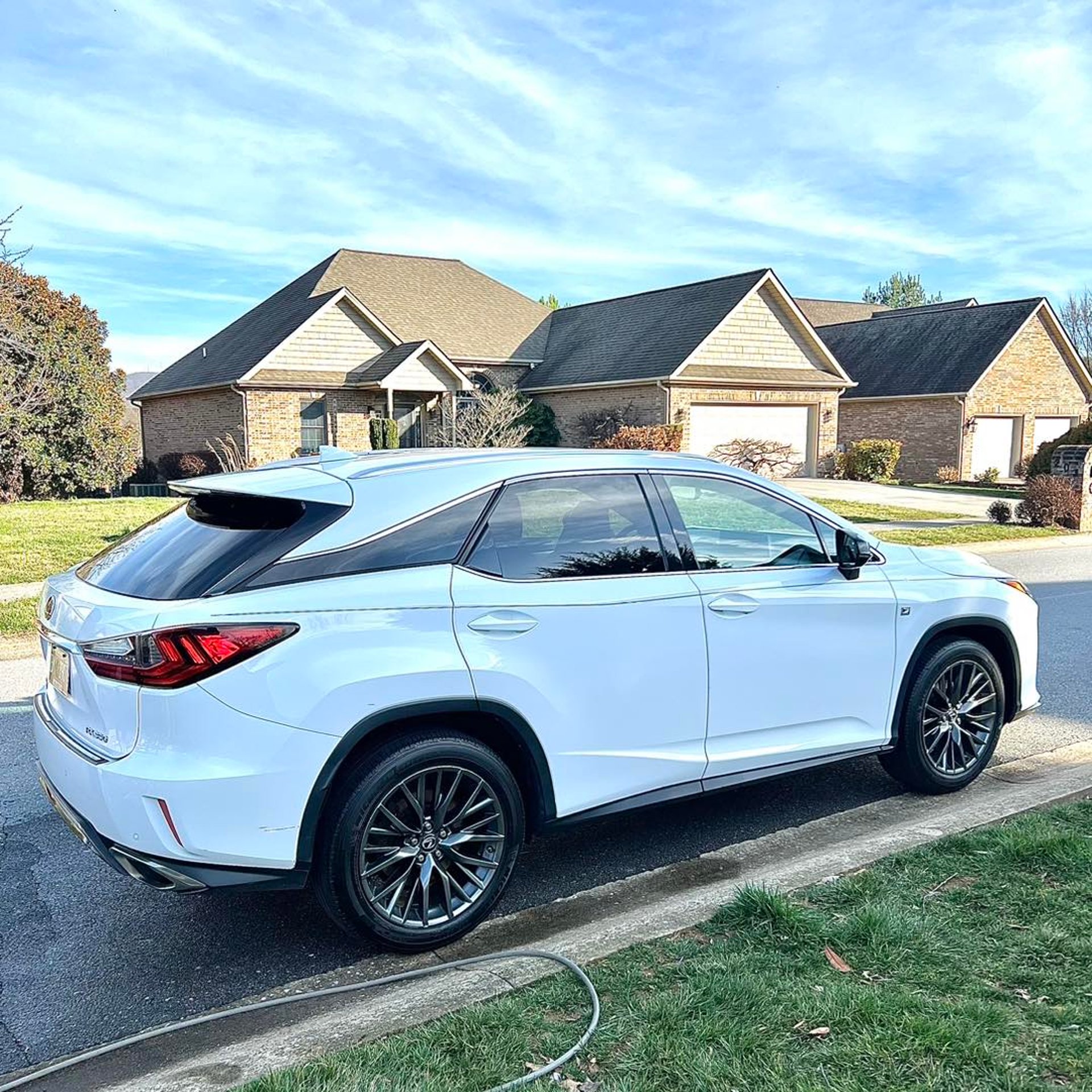 black and brown leather padded tub sofa