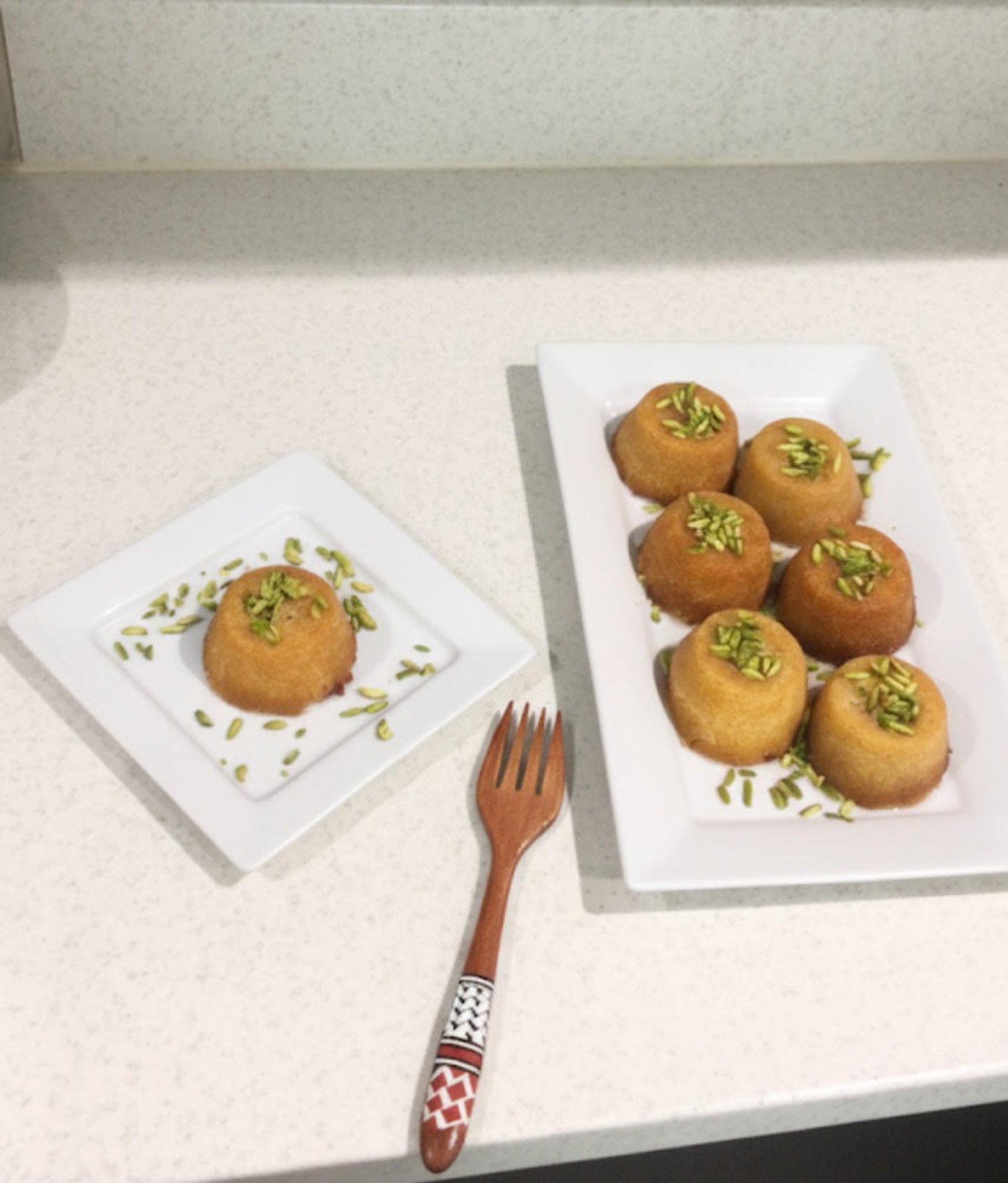 an abstract photo of a curved building with a blue sky in the background