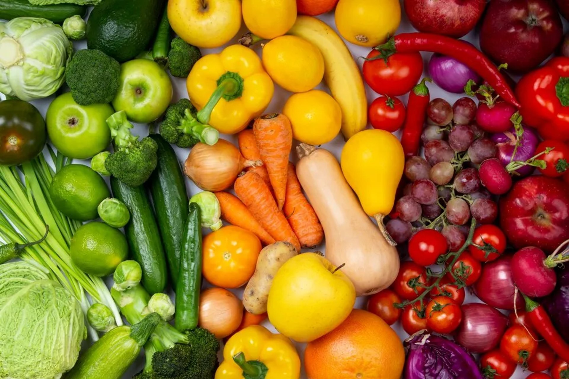 a basket filled with lots of different types of vegetables