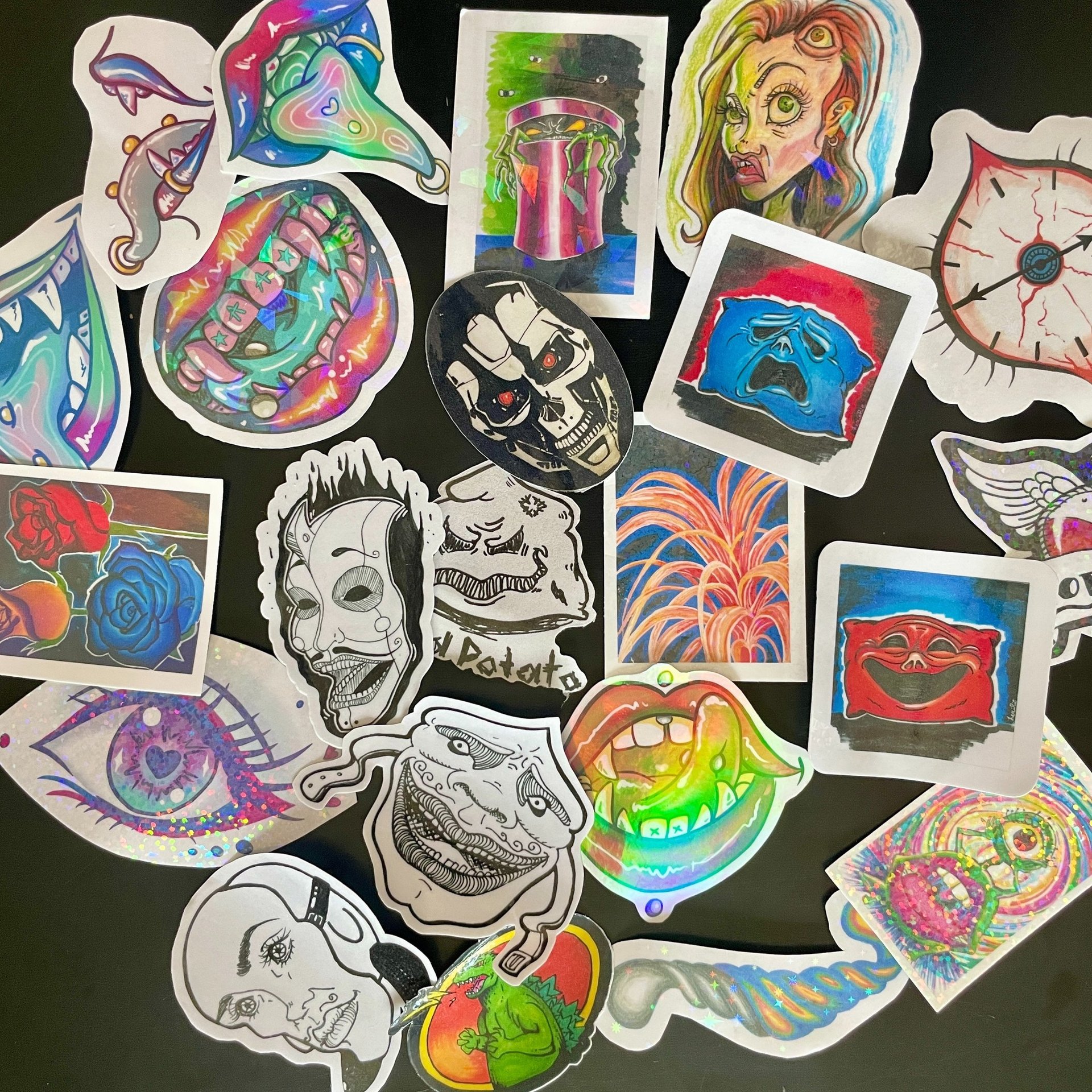 image of handmade stickers, art prints, and paintings