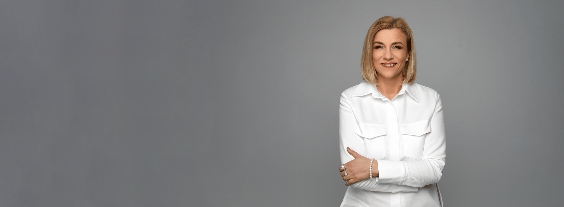 a woman in grey background