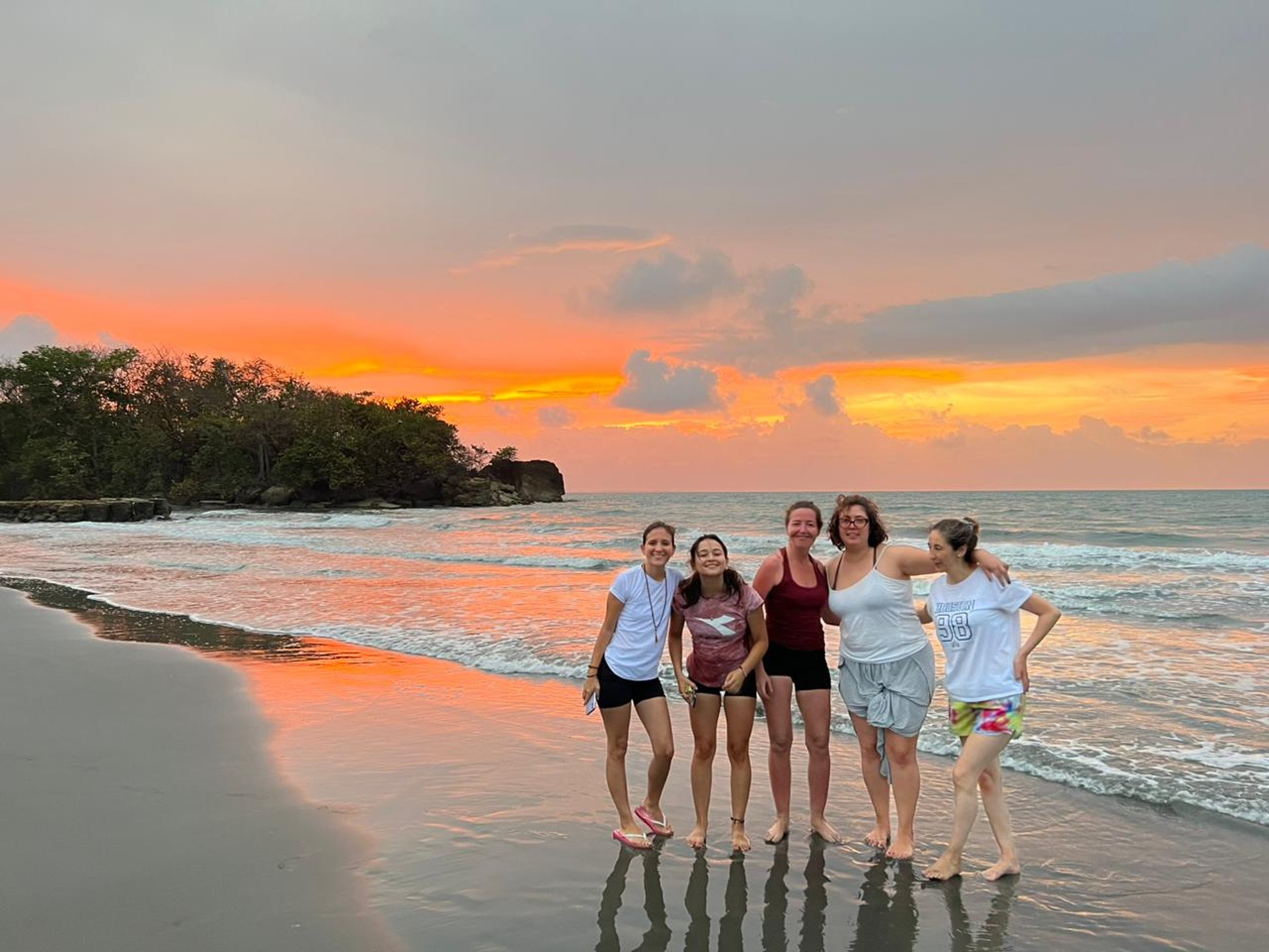 an abstract photo of a curved building with a blue sky in the background