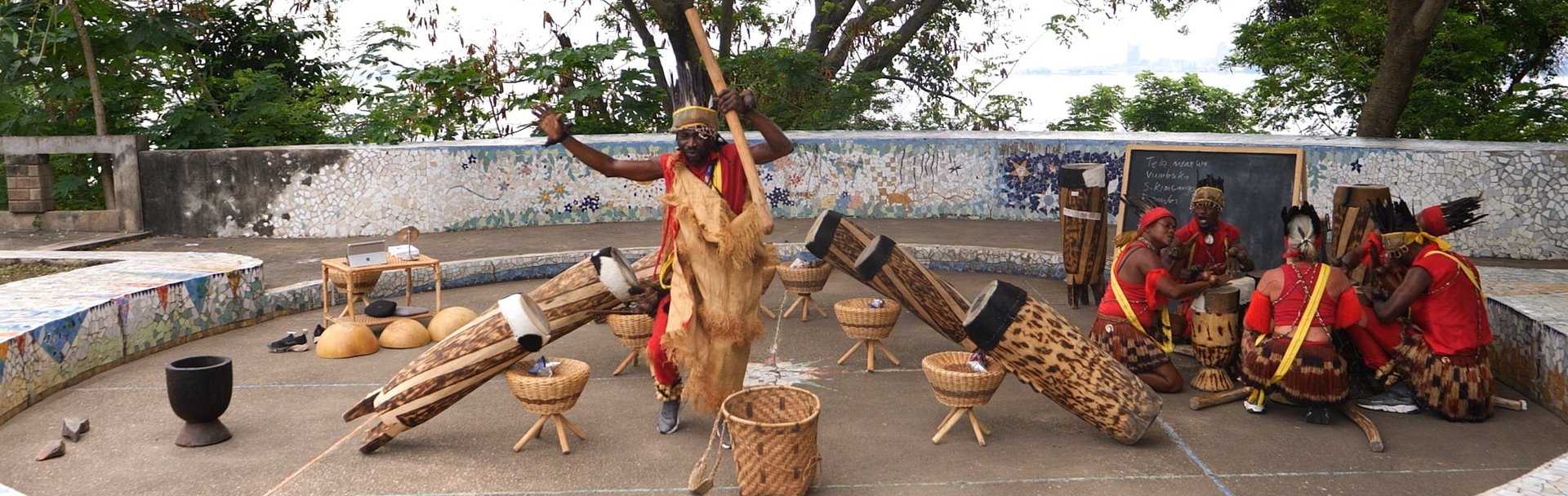 woman wearing yellow long-sleeved dress under white clouds and blue sky during daytime