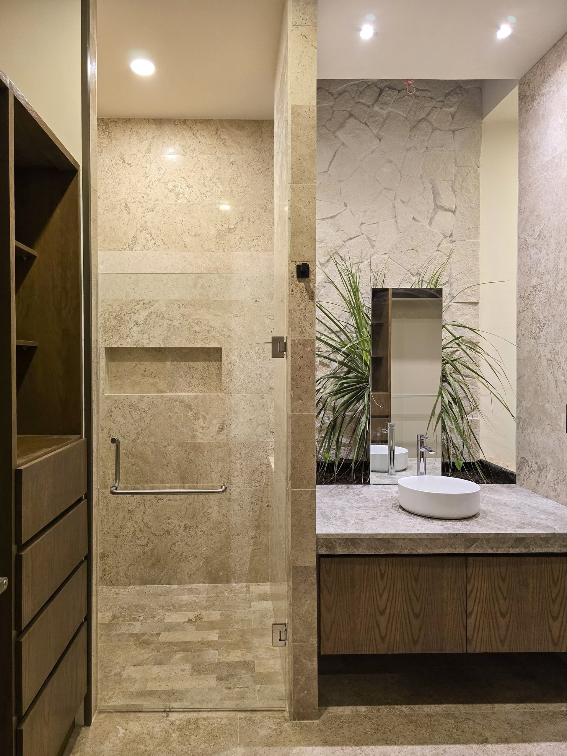 an abstract photo of a curved building with a blue sky in the background