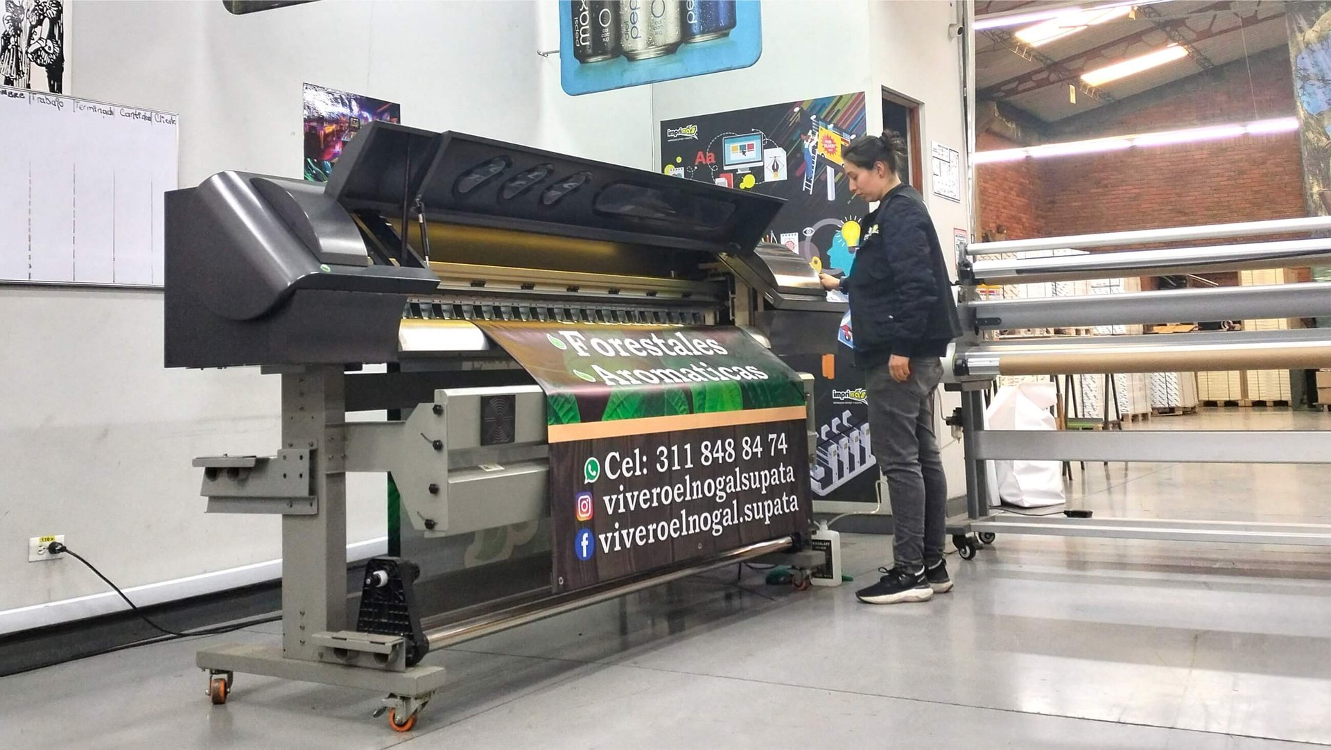 a machine that is cutting a sheet of paper