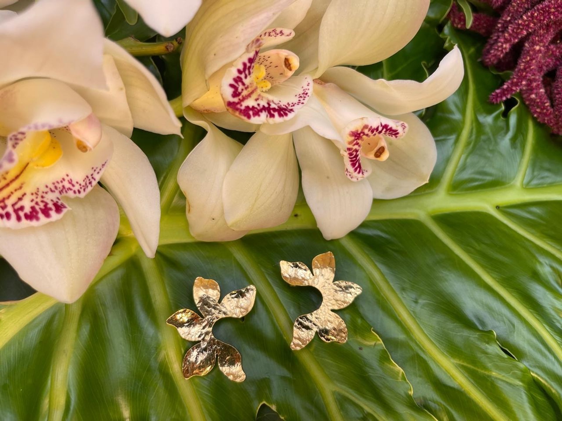 an abstract photo of a curved building with a blue sky in the background