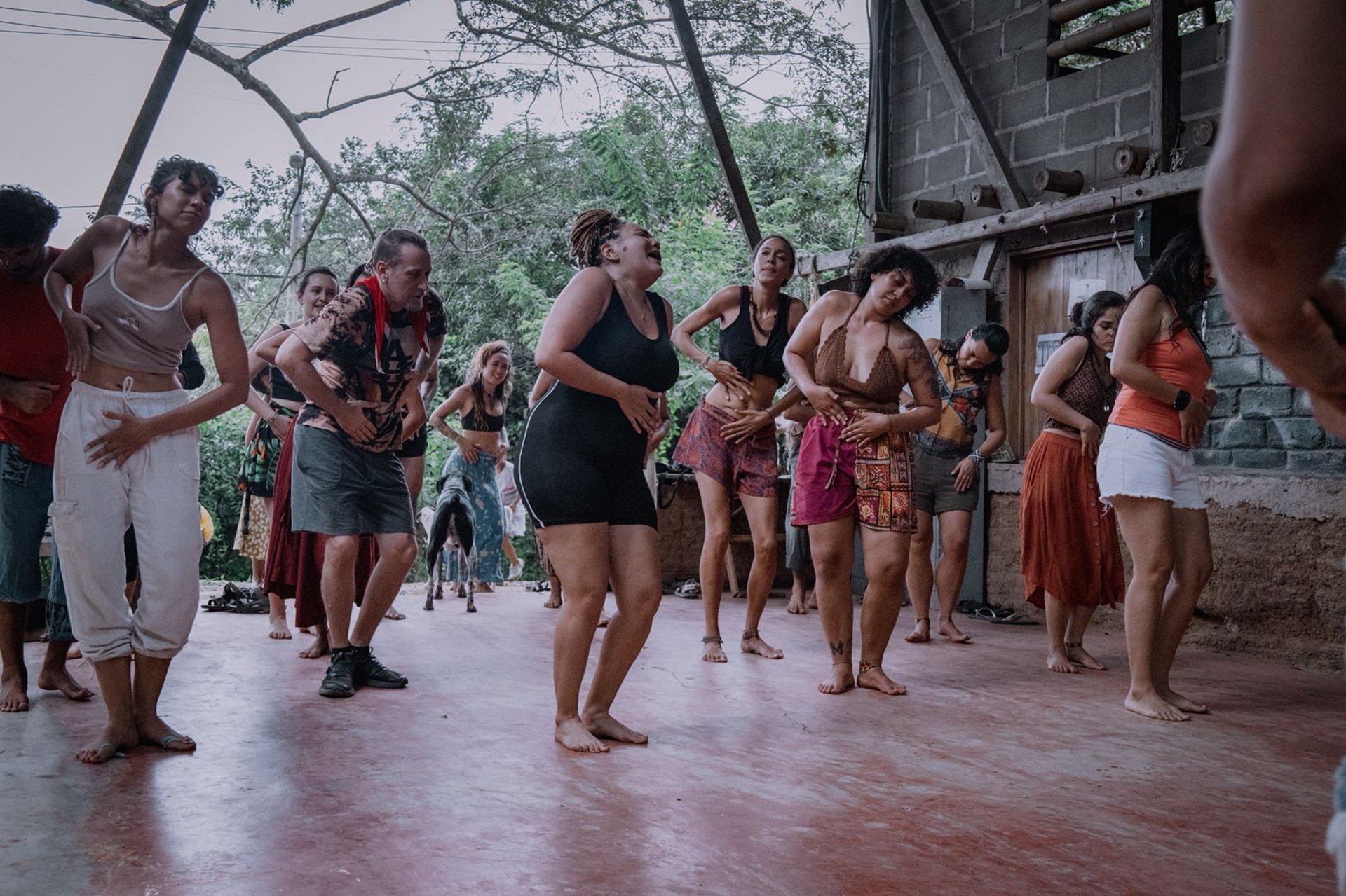an abstract photo of a curved building with a blue sky in the background