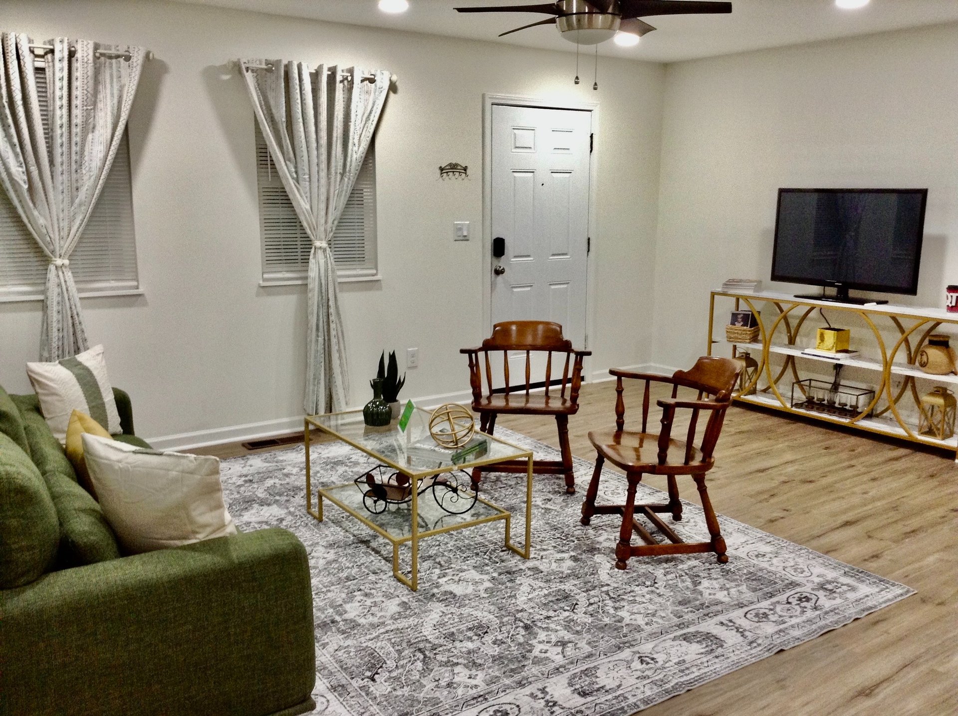 black and brown leather padded tub sofa