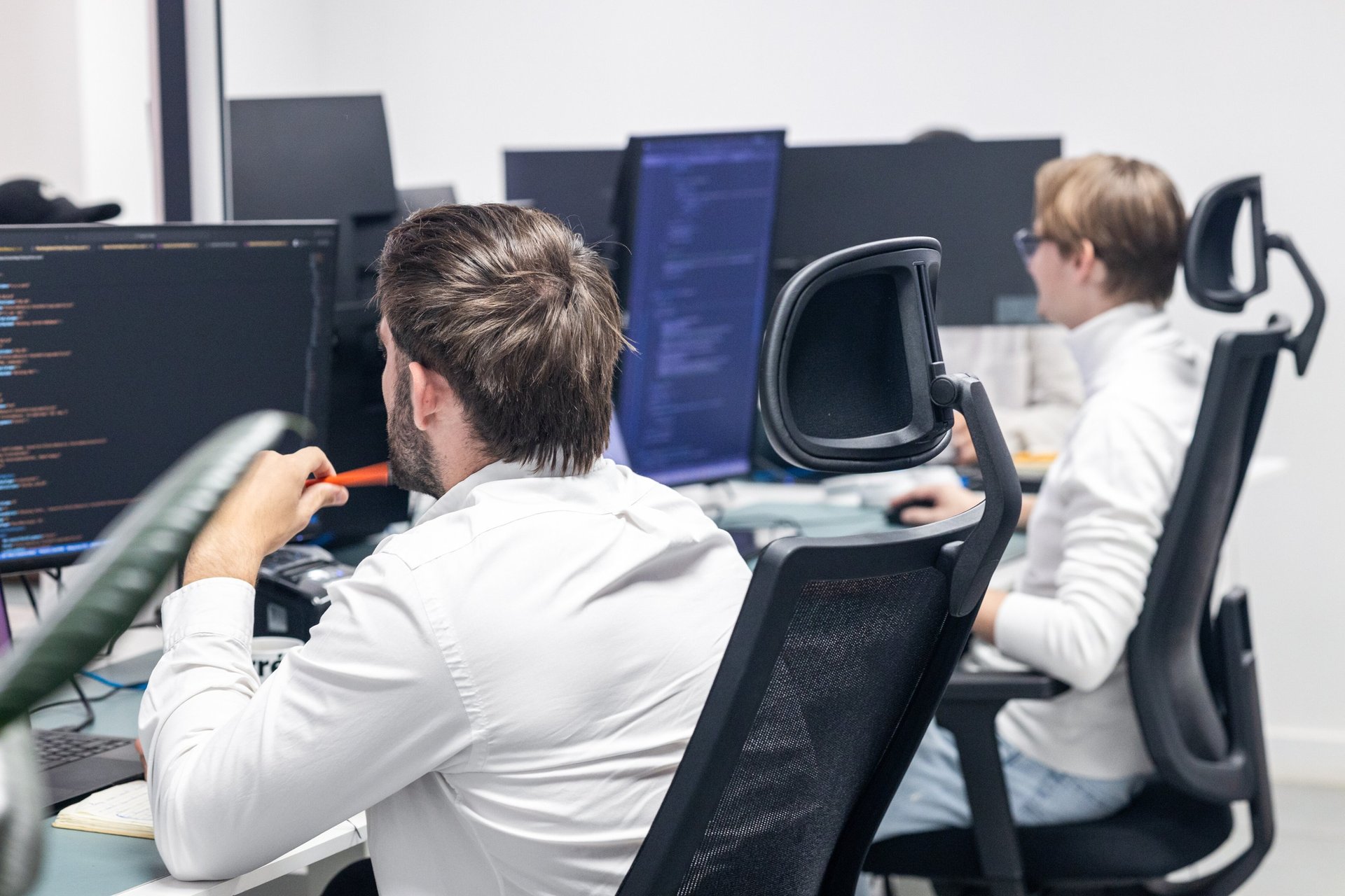 black and brown leather padded tub sofa