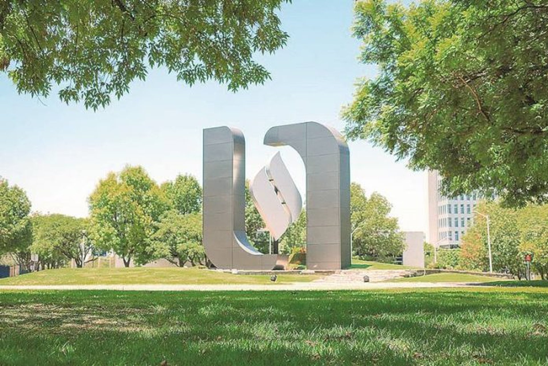 black and brown leather padded tub sofa