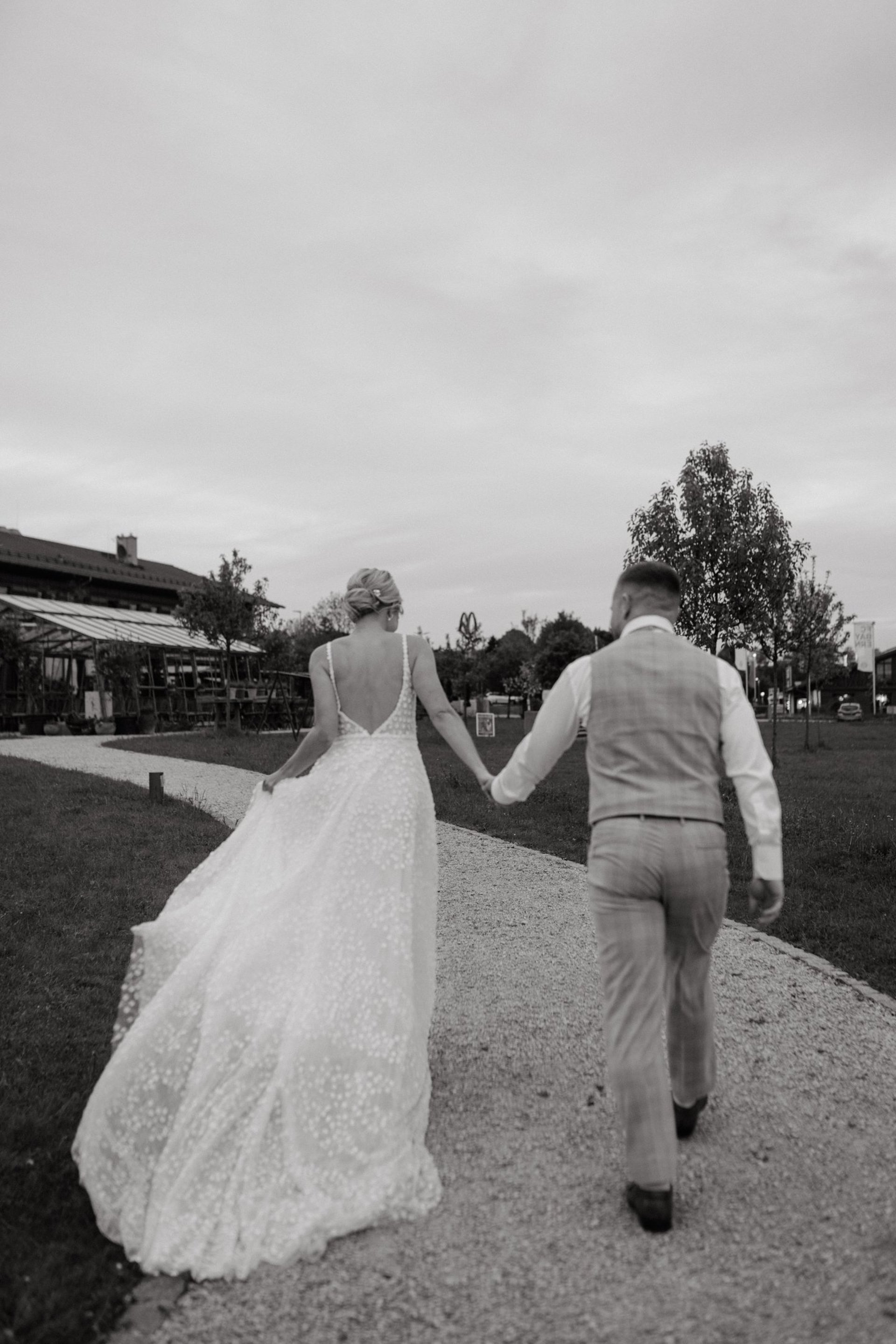 an abstract photo of a curved building with a blue sky in the background