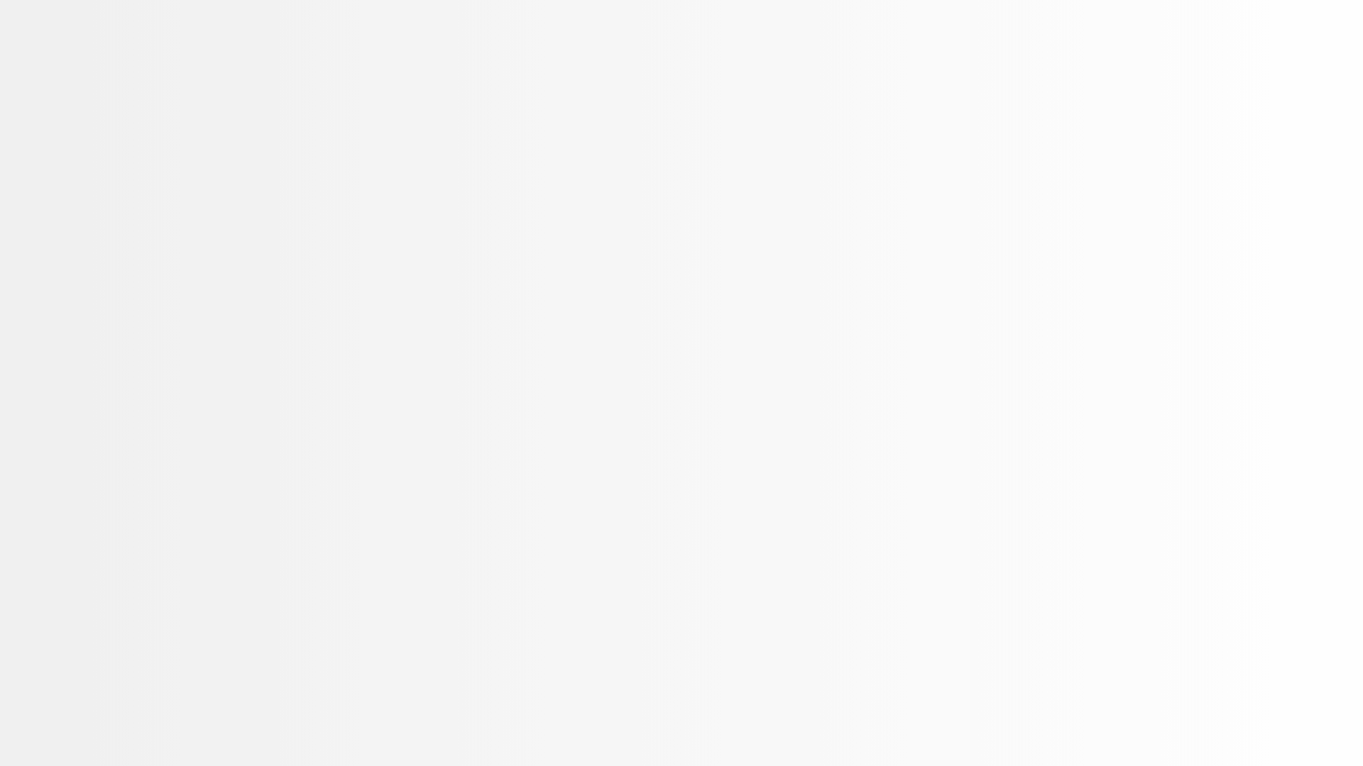 an abstract photo of a curved building with a blue sky in the background