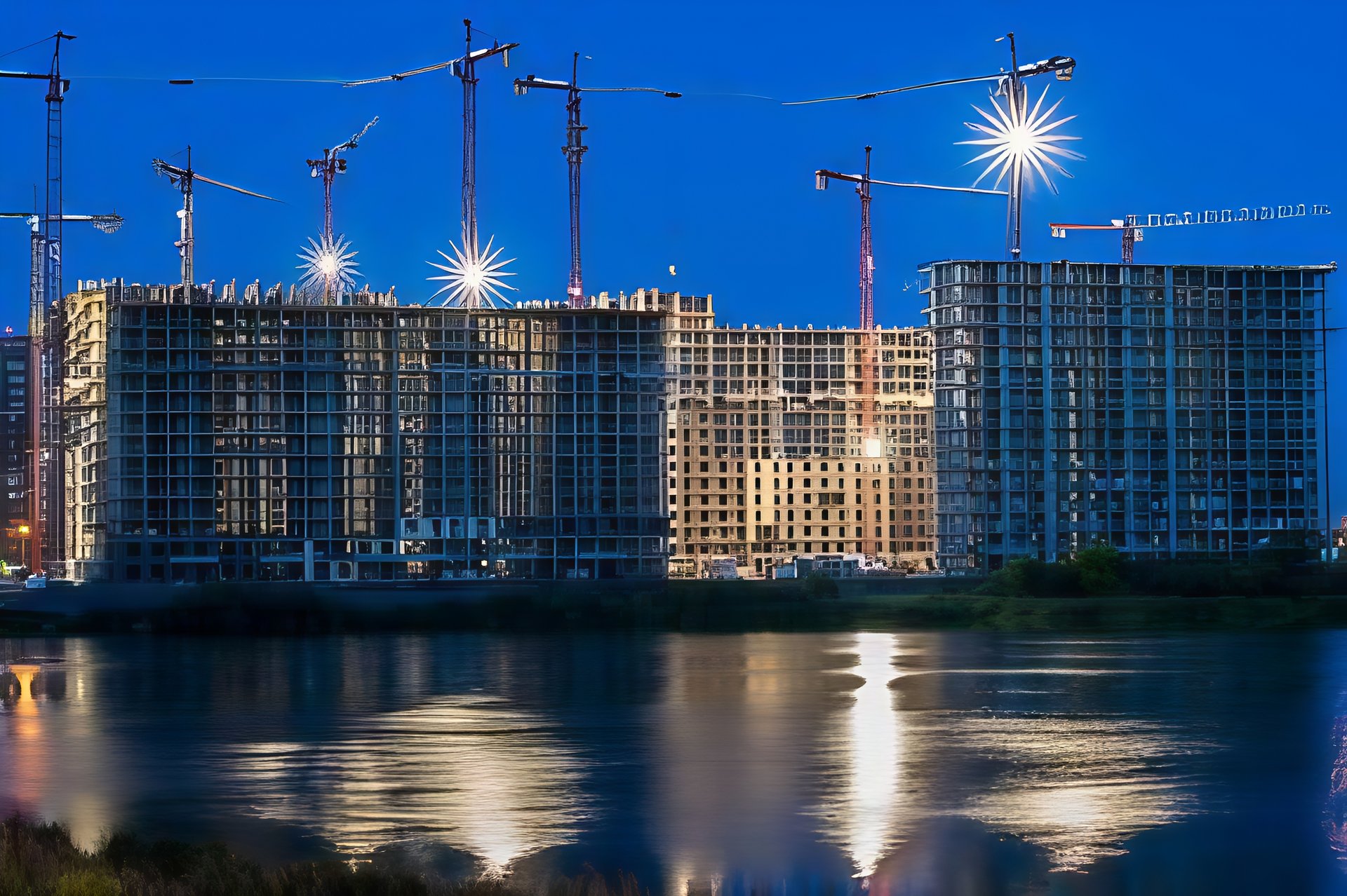 low-angle photography of four high-rise buildings