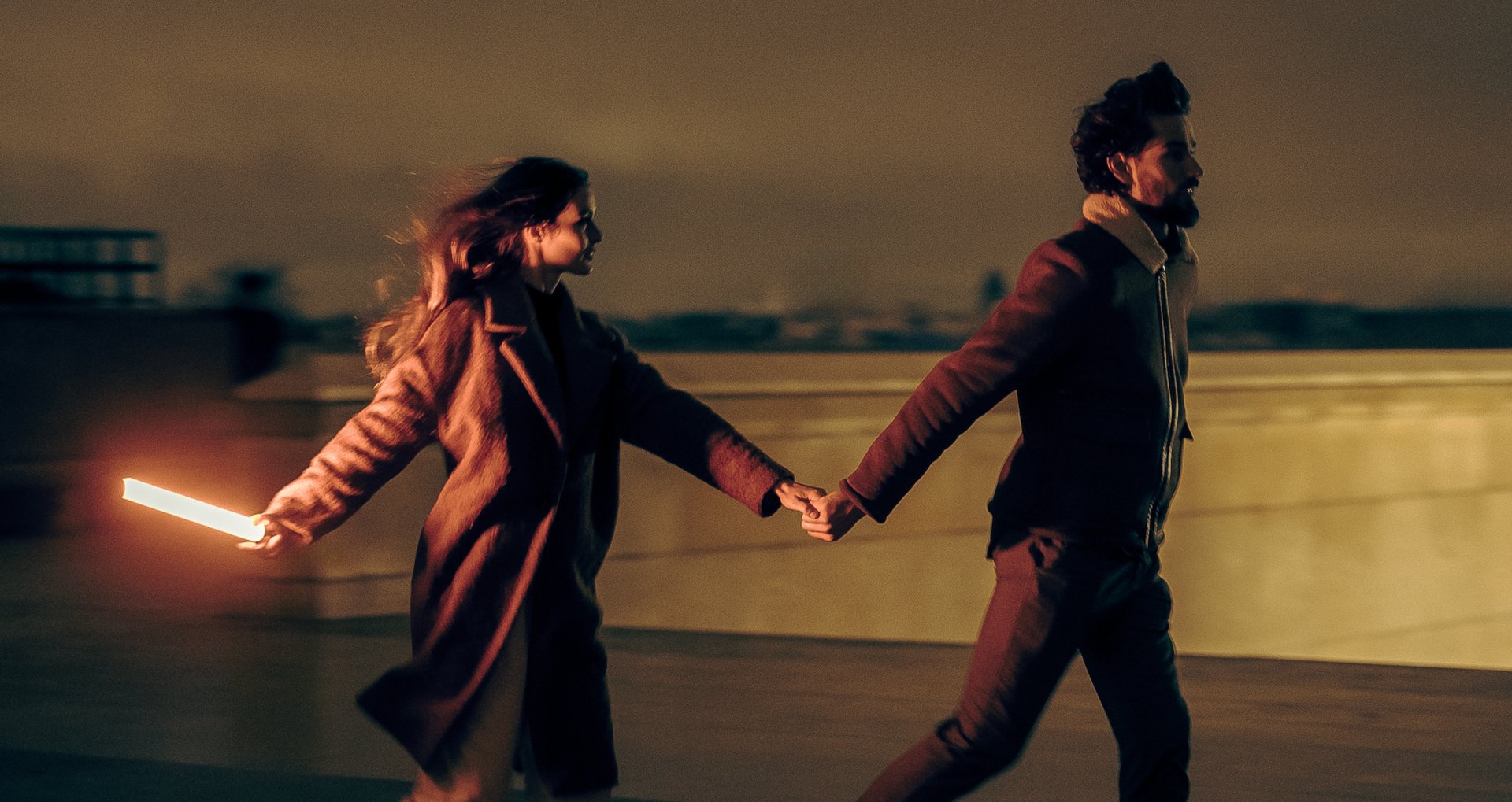an abstract photo of a curved building with a blue sky in the background