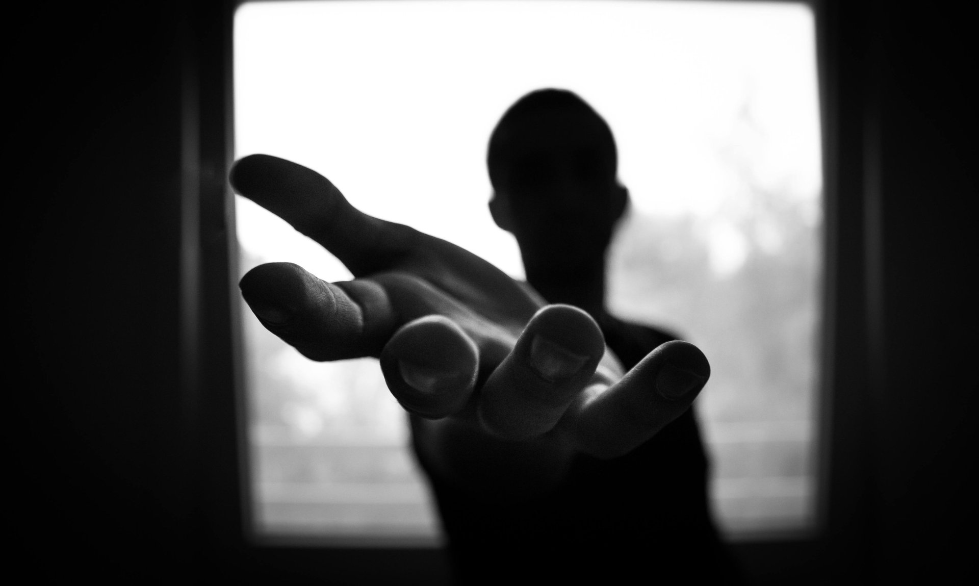 two hands about to hold wallpaper