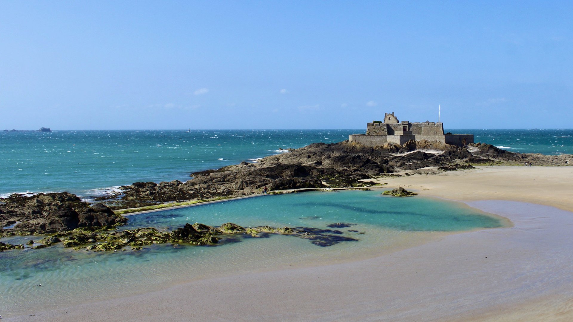 woman wearing yellow long-sleeved dress under white clouds and blue sky during daytime