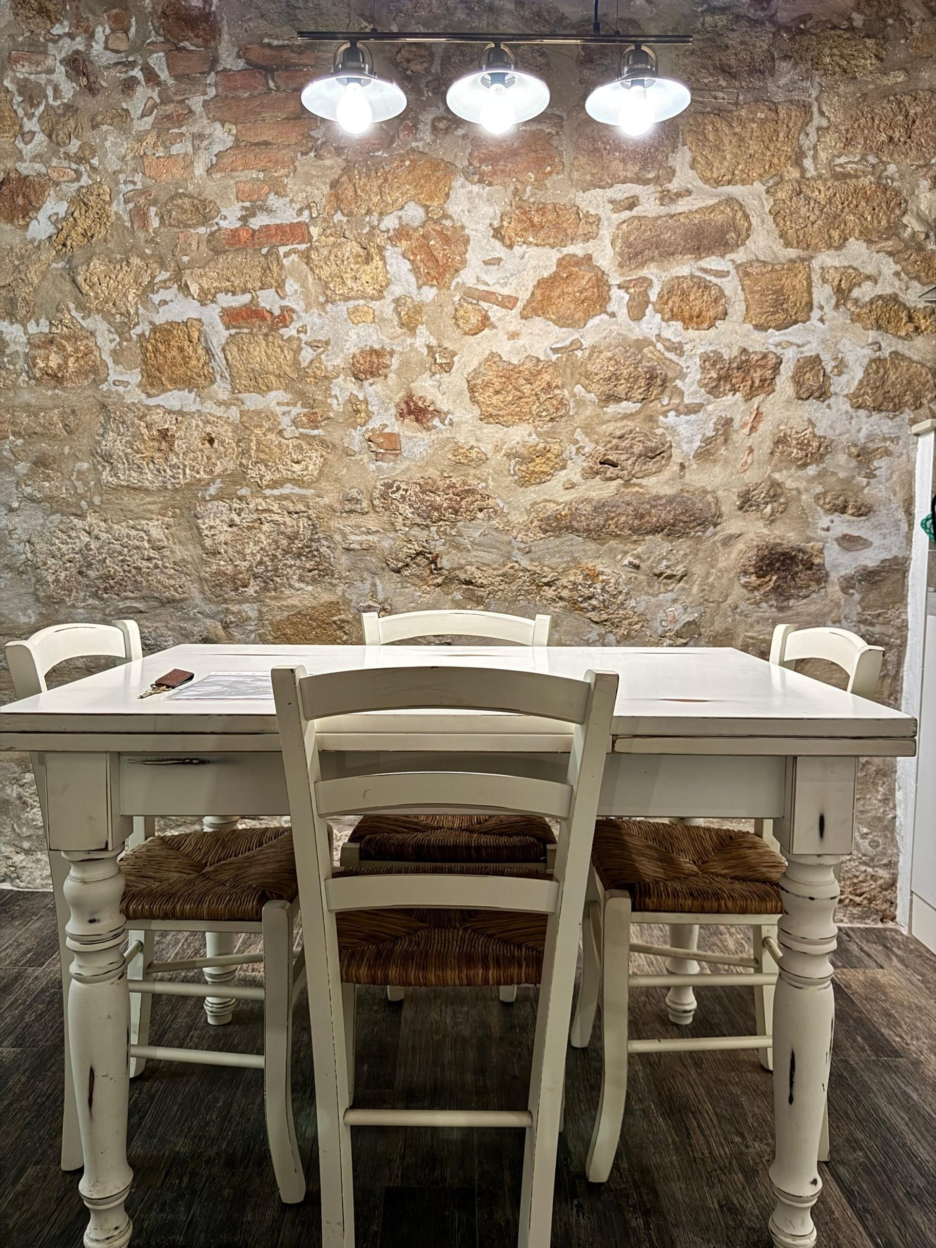 woman wearing yellow long-sleeved dress under white clouds and blue sky during daytime