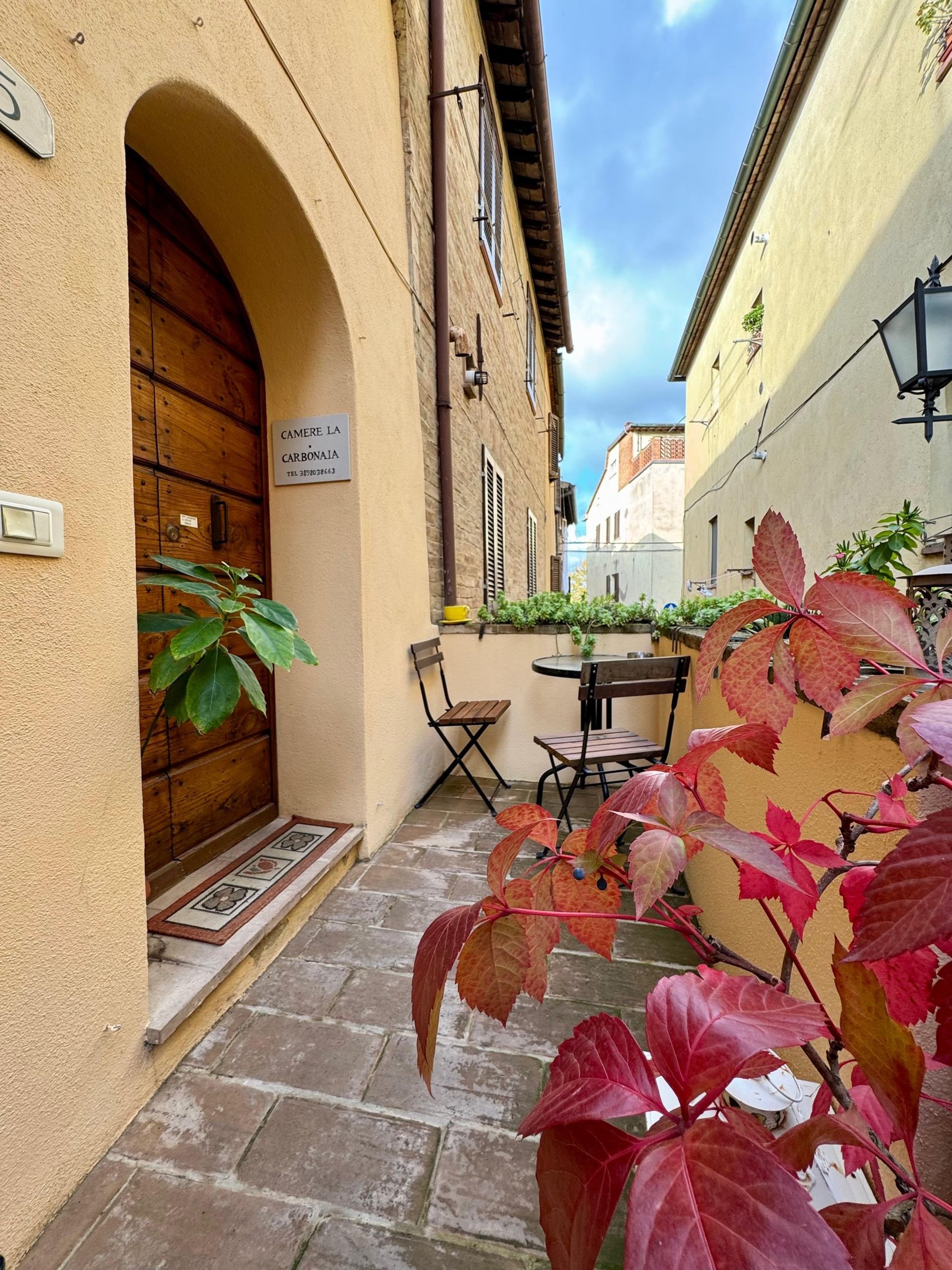 black and brown leather padded tub sofa