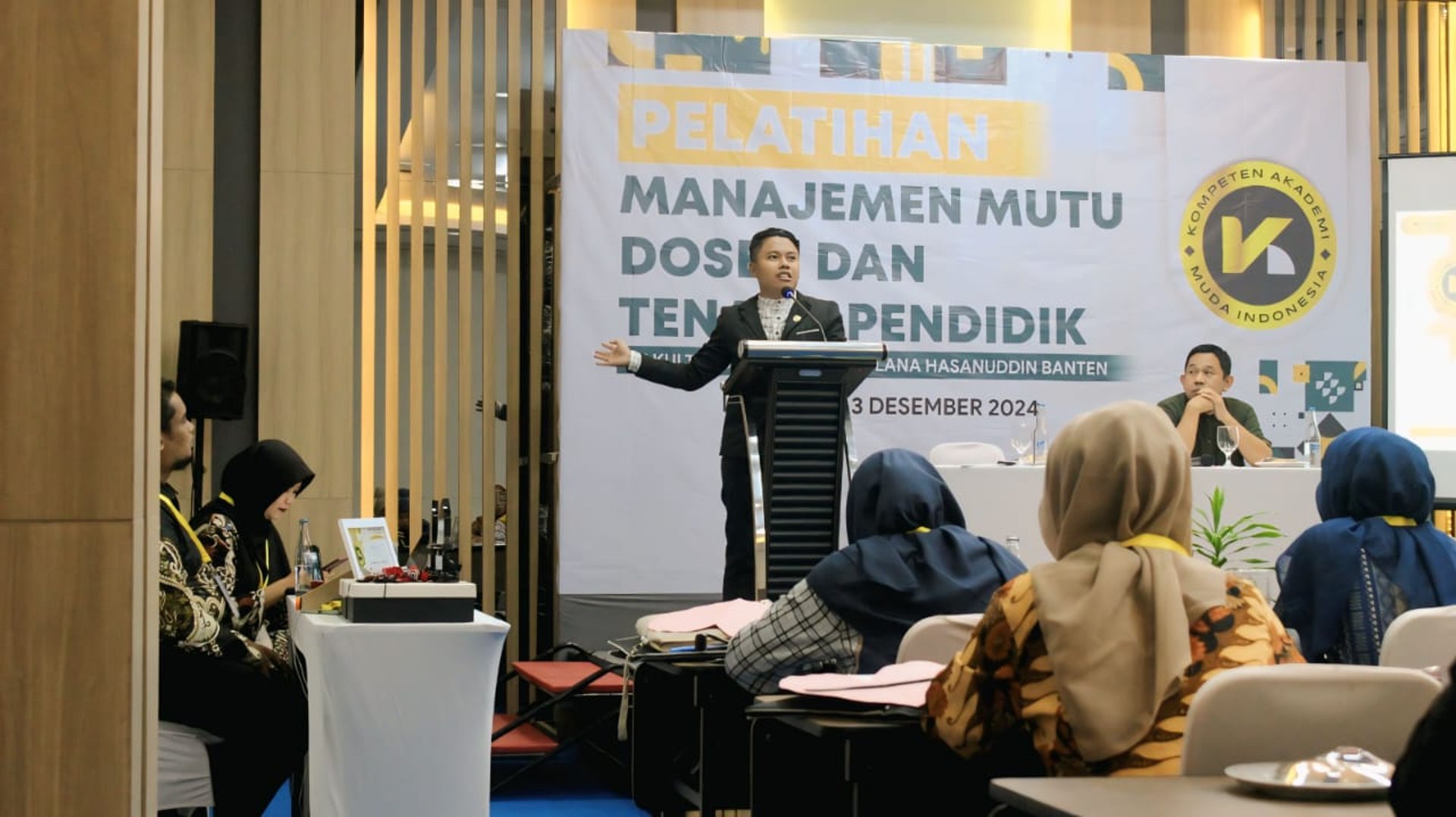 black and brown leather padded tub sofa