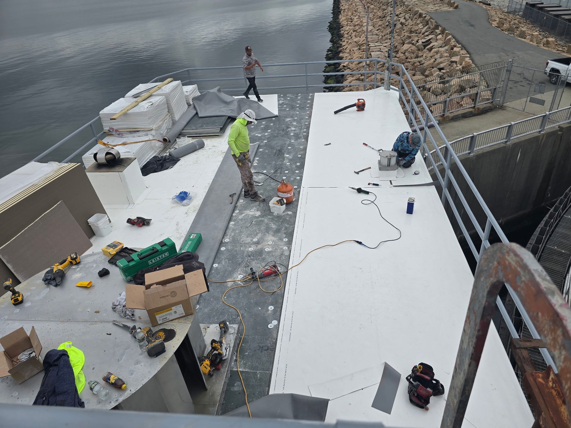 an abstract photo of a curved building with a blue sky in the background