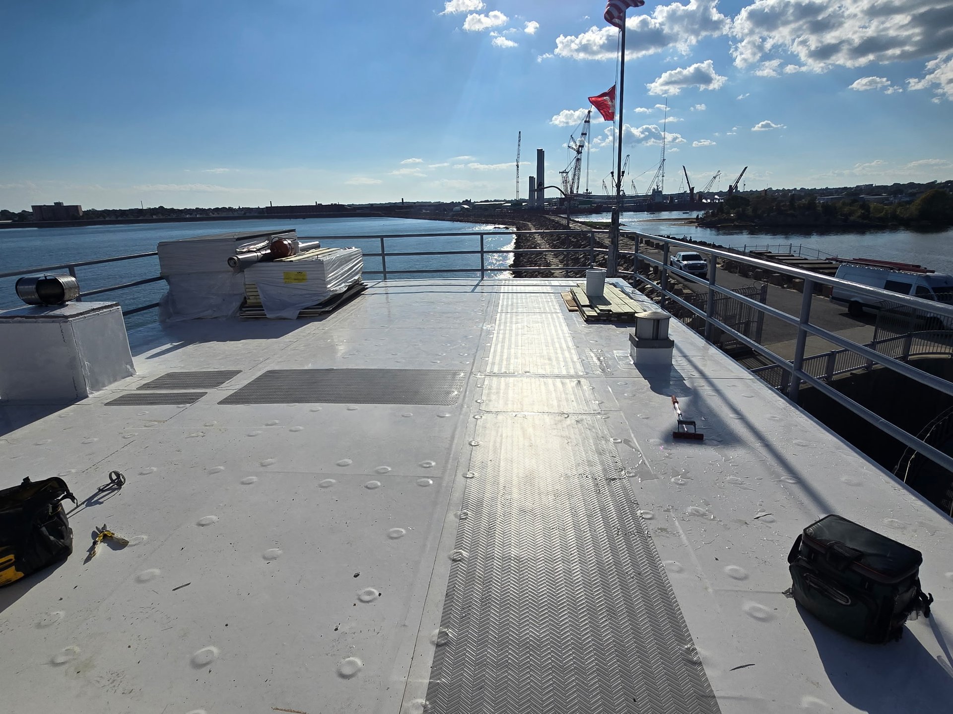 an abstract photo of a curved building with a blue sky in the background