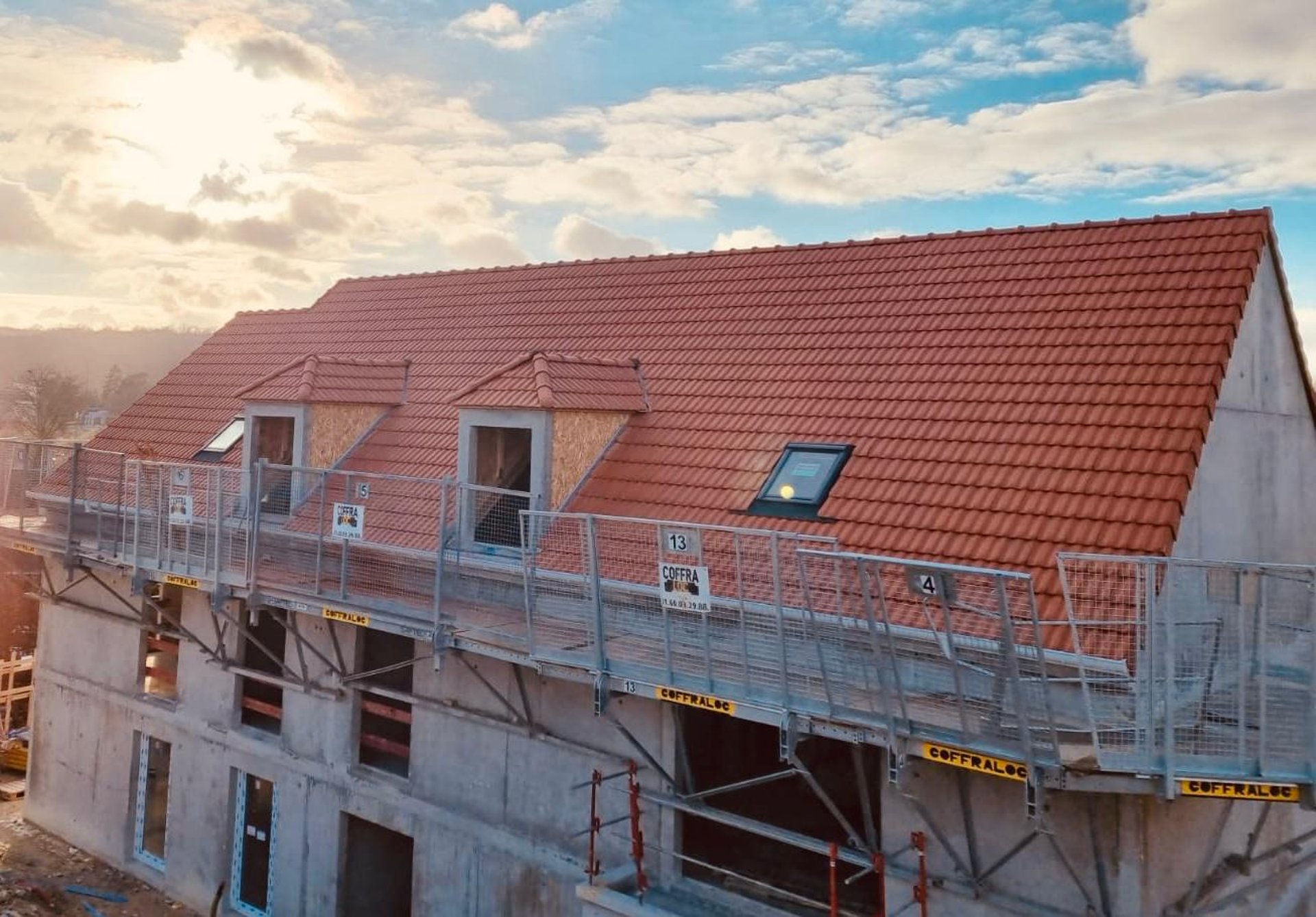 A man on a roof working on a roof