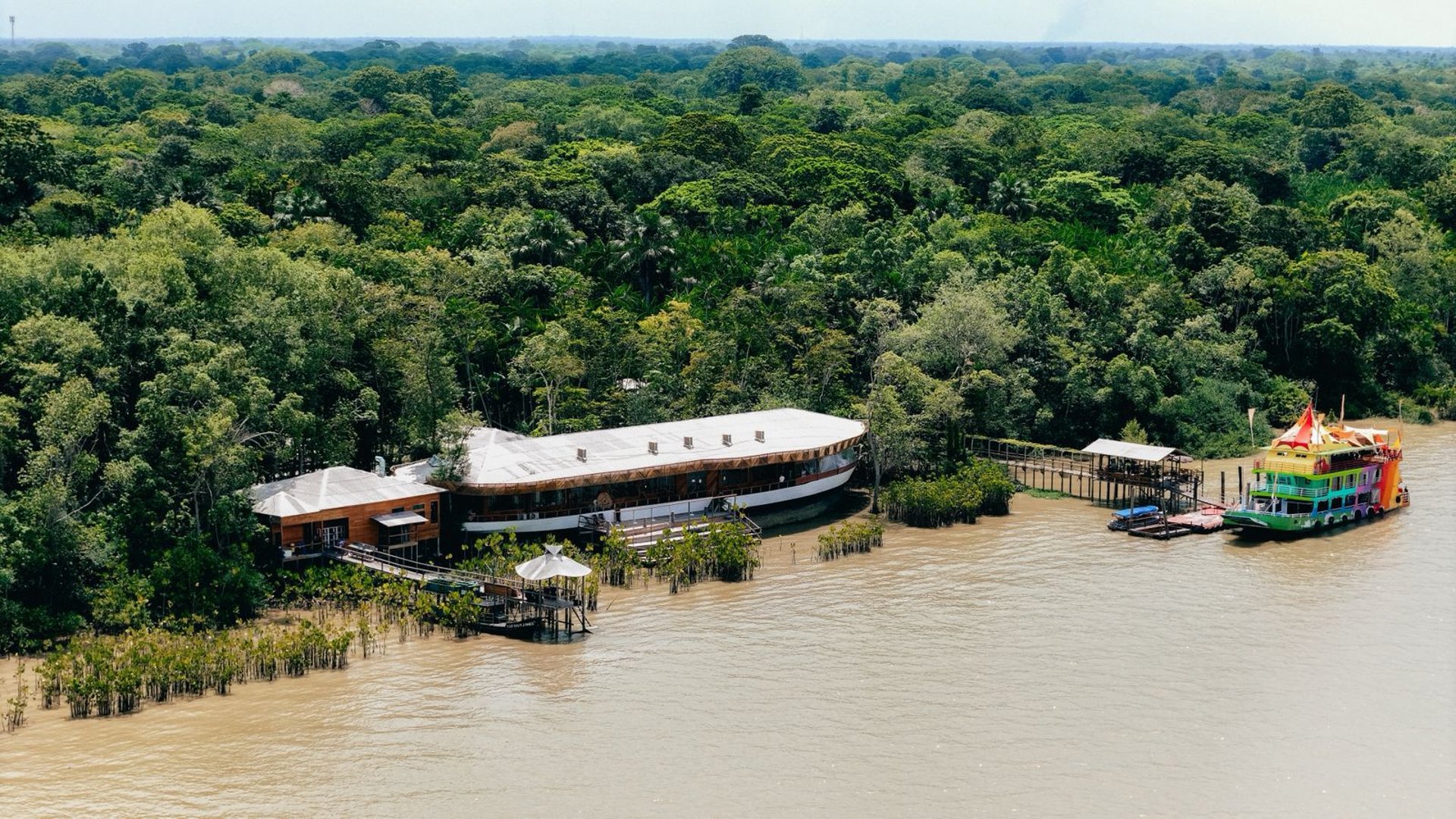 woman wearing yellow long-sleeved dress under white clouds and blue sky during daytime