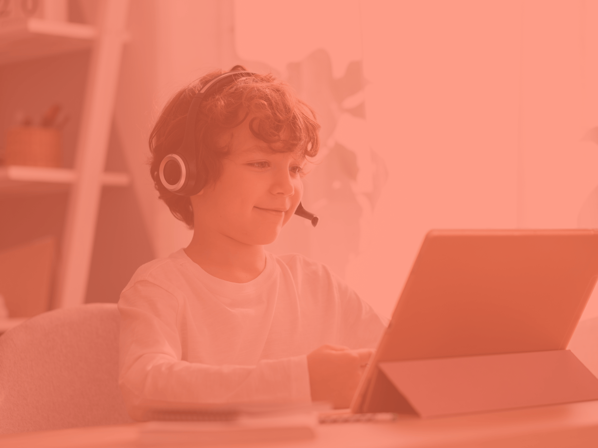 a dark room with tables and chairs and a projector screen