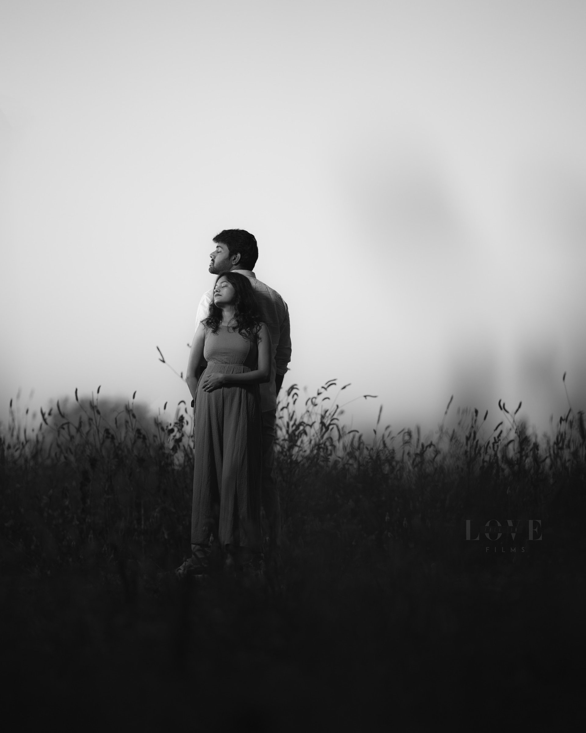 an abstract photo of a curved building with a blue sky in the background