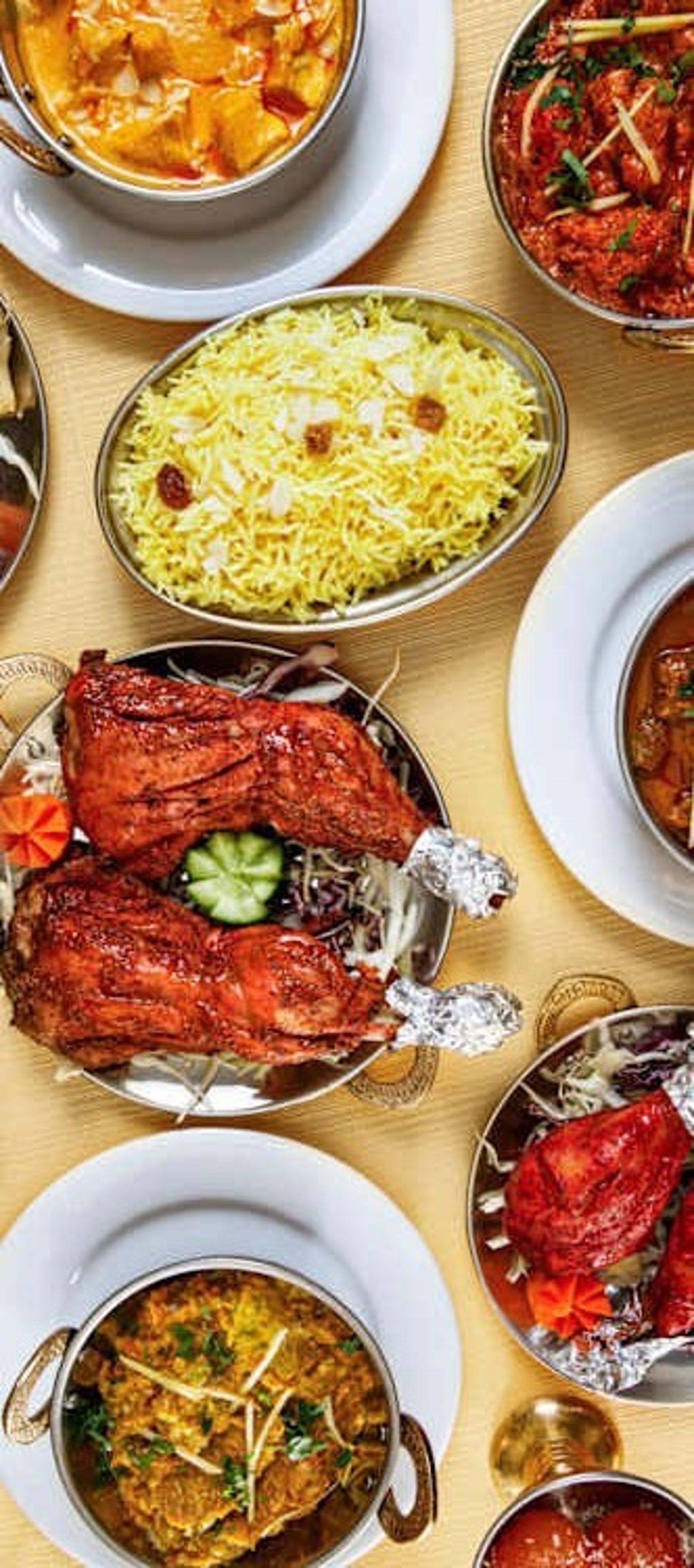 woman wearing yellow long-sleeved dress under white clouds and blue sky during daytime
