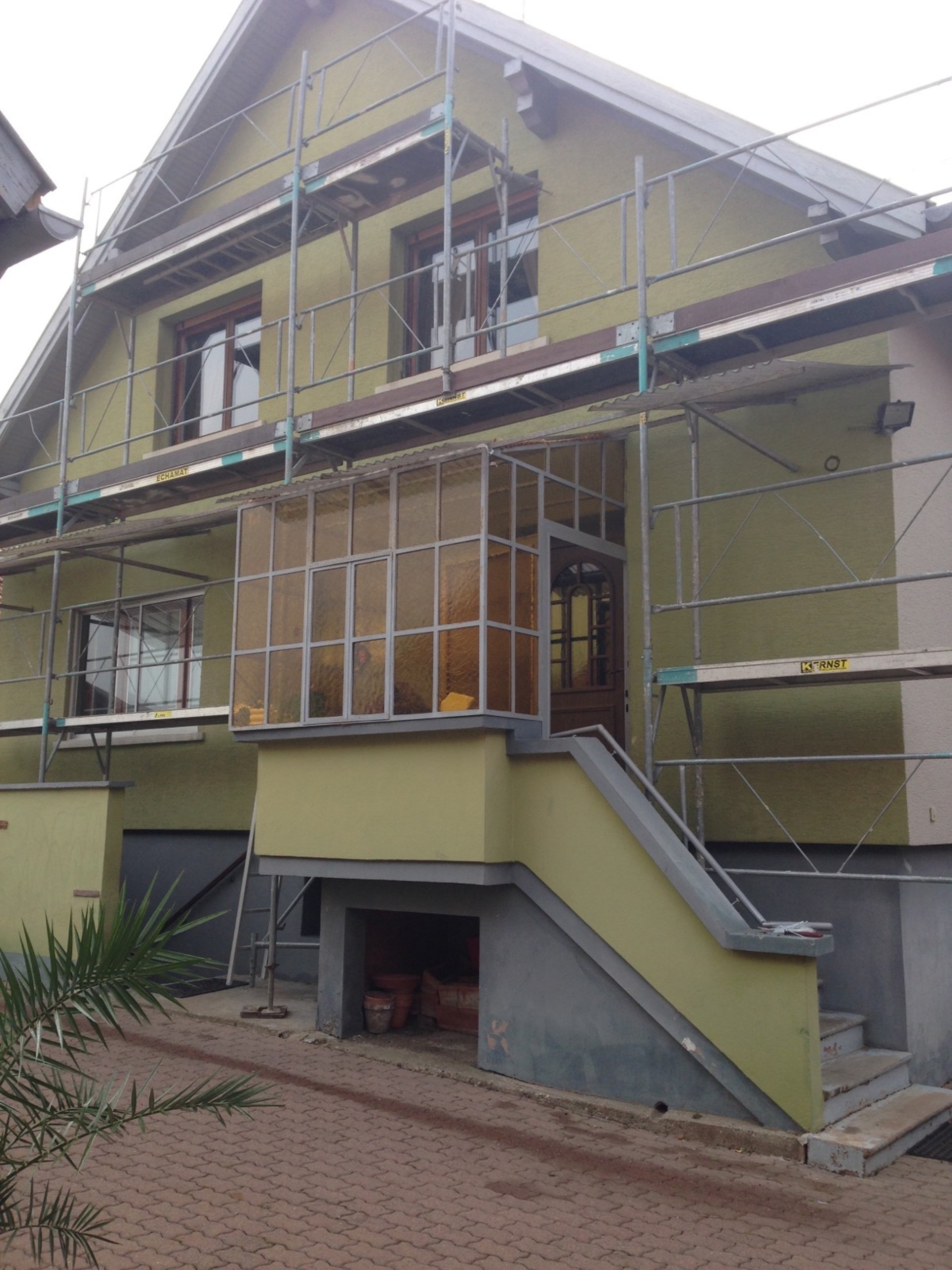 black and brown leather padded tub sofa