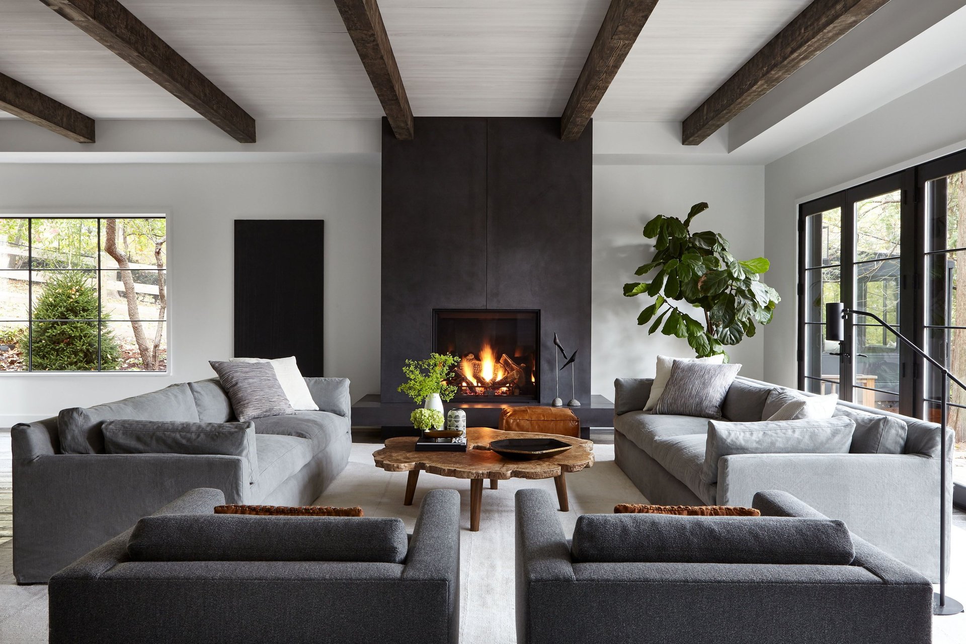 black and brown leather padded tub sofa