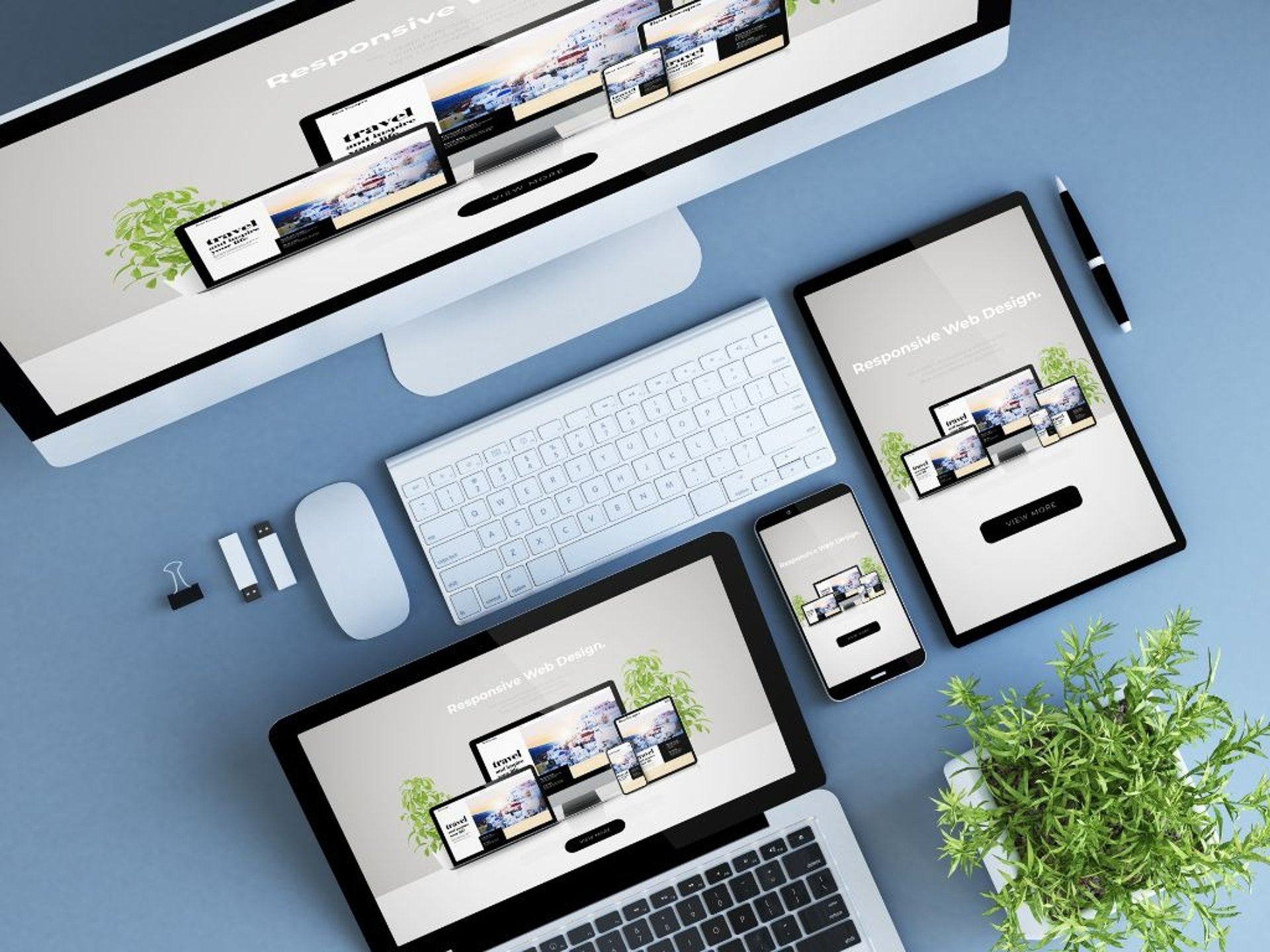 MacBook Pro near green potted plant on table