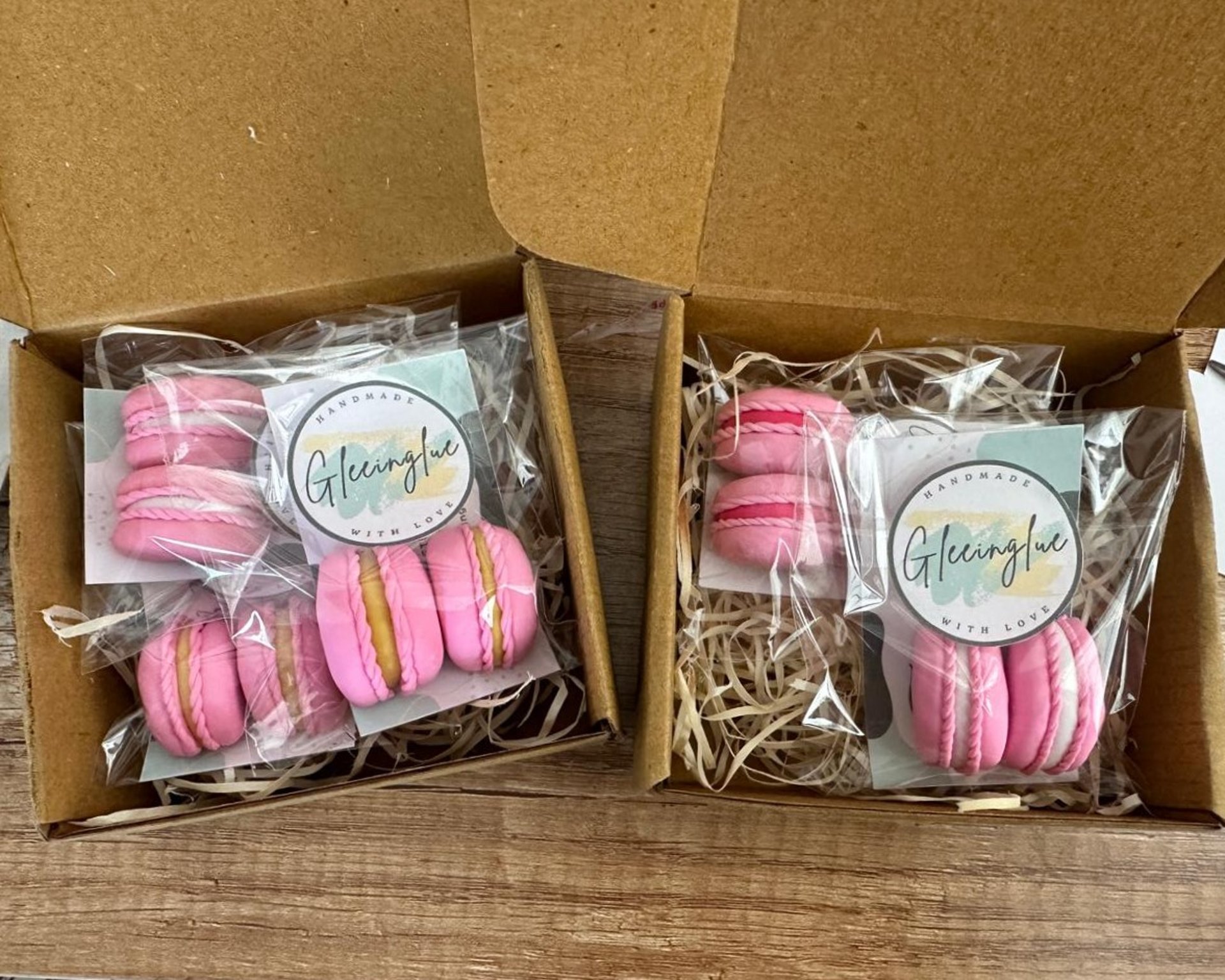 handmade pink macaron fridge magnets made of polymer clay packaged in brown gift boxes with Gleeinglue branding stickers 