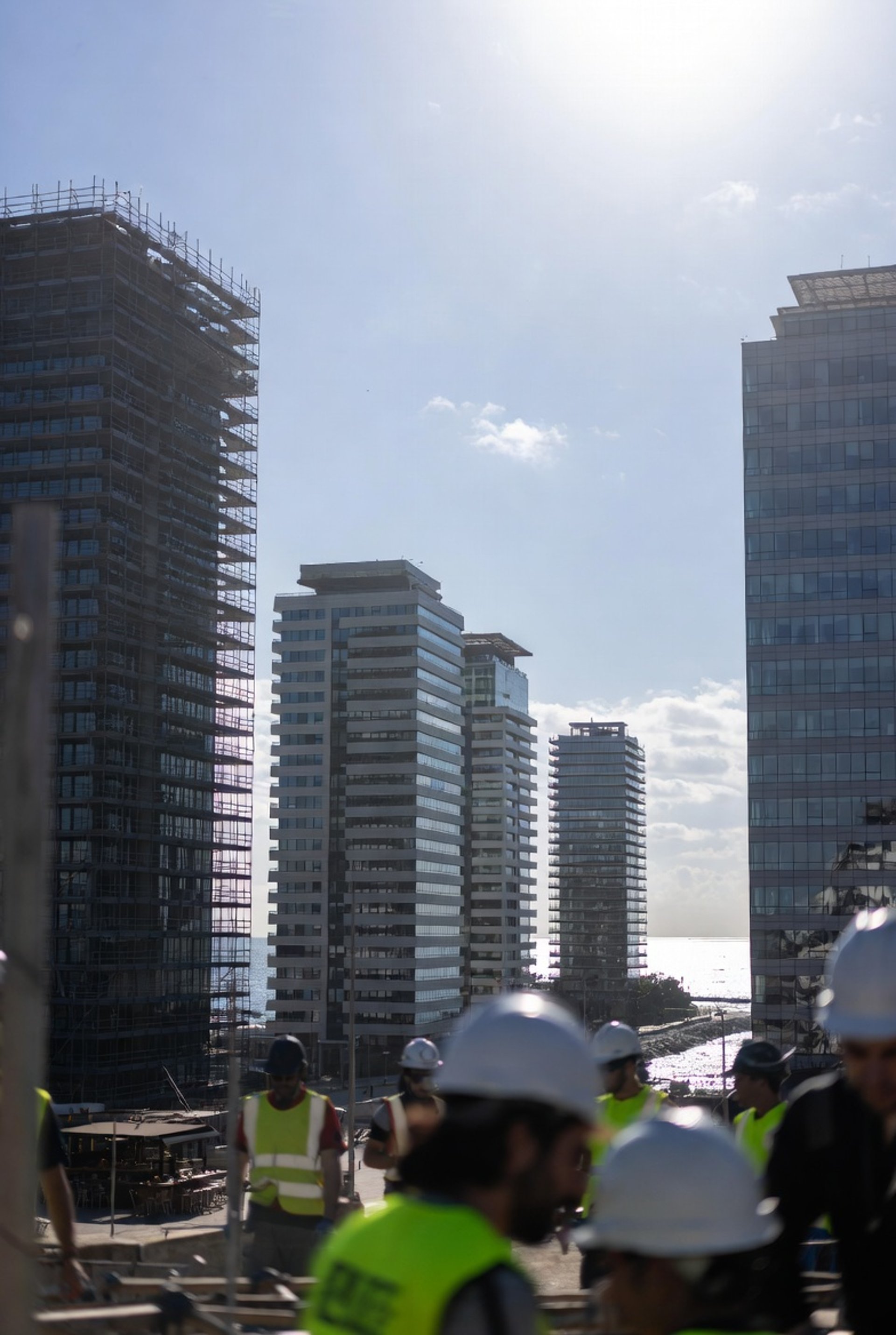 woman wearing yellow long-sleeved dress under white clouds and blue sky during daytime
