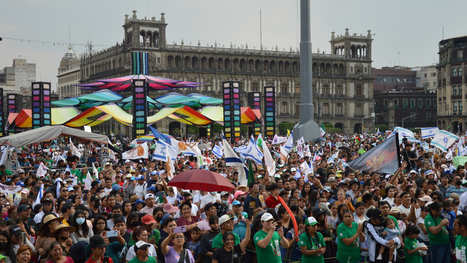 group of people waving their hands