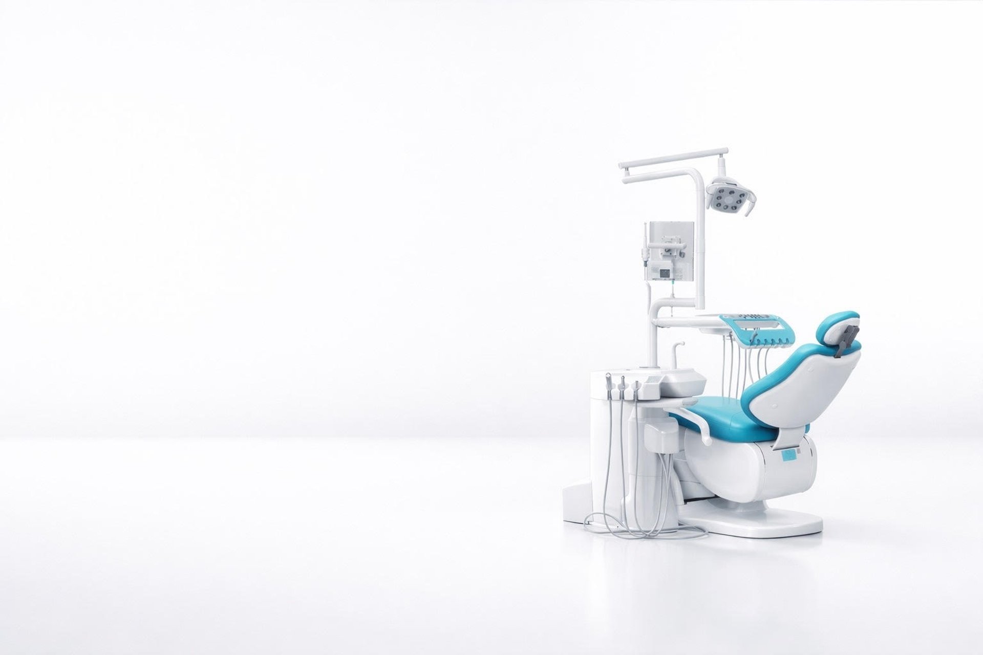 a dental room with a desk and chairs