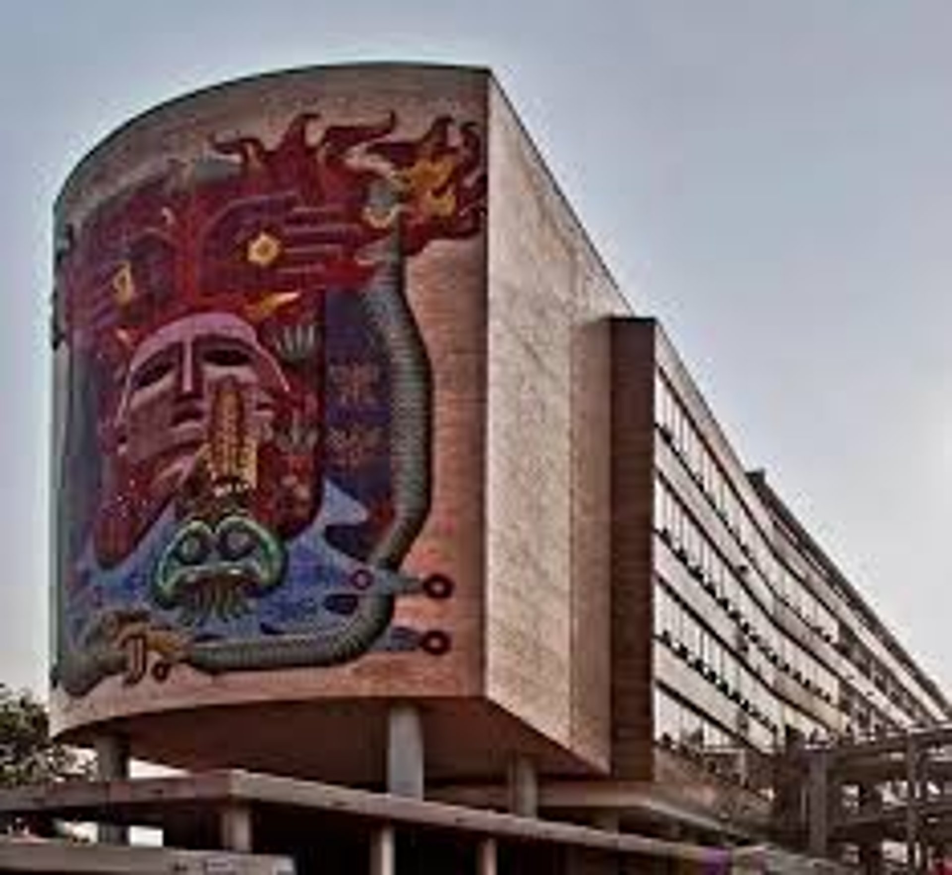 a building with a large mural on the wall