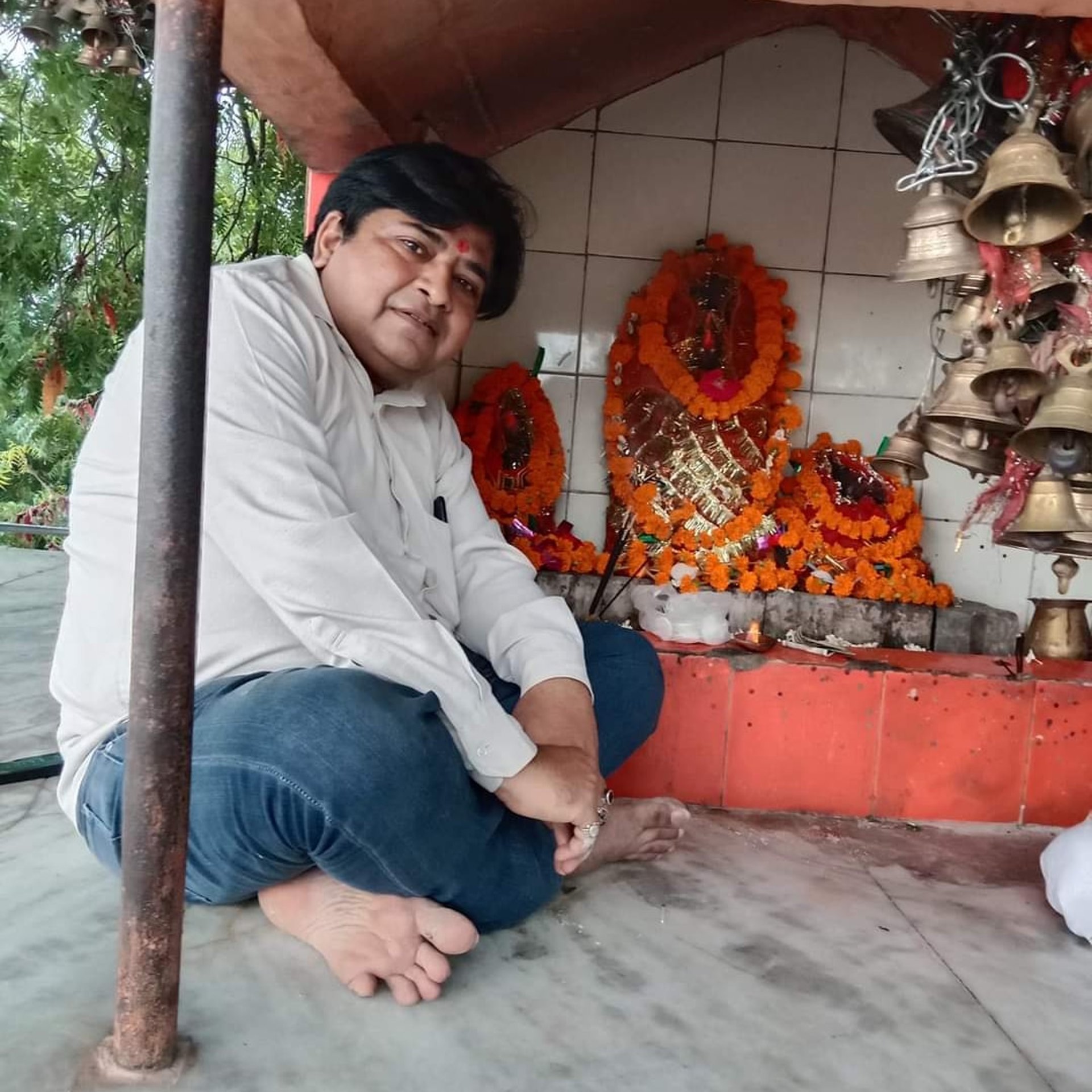 woman wearing yellow long-sleeved dress under white clouds and blue sky during daytime