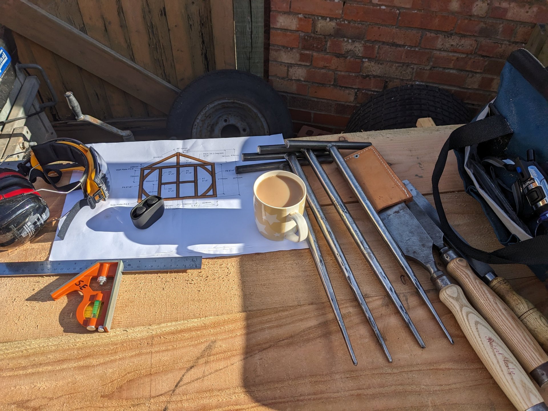 black and brown leather padded tub sofa