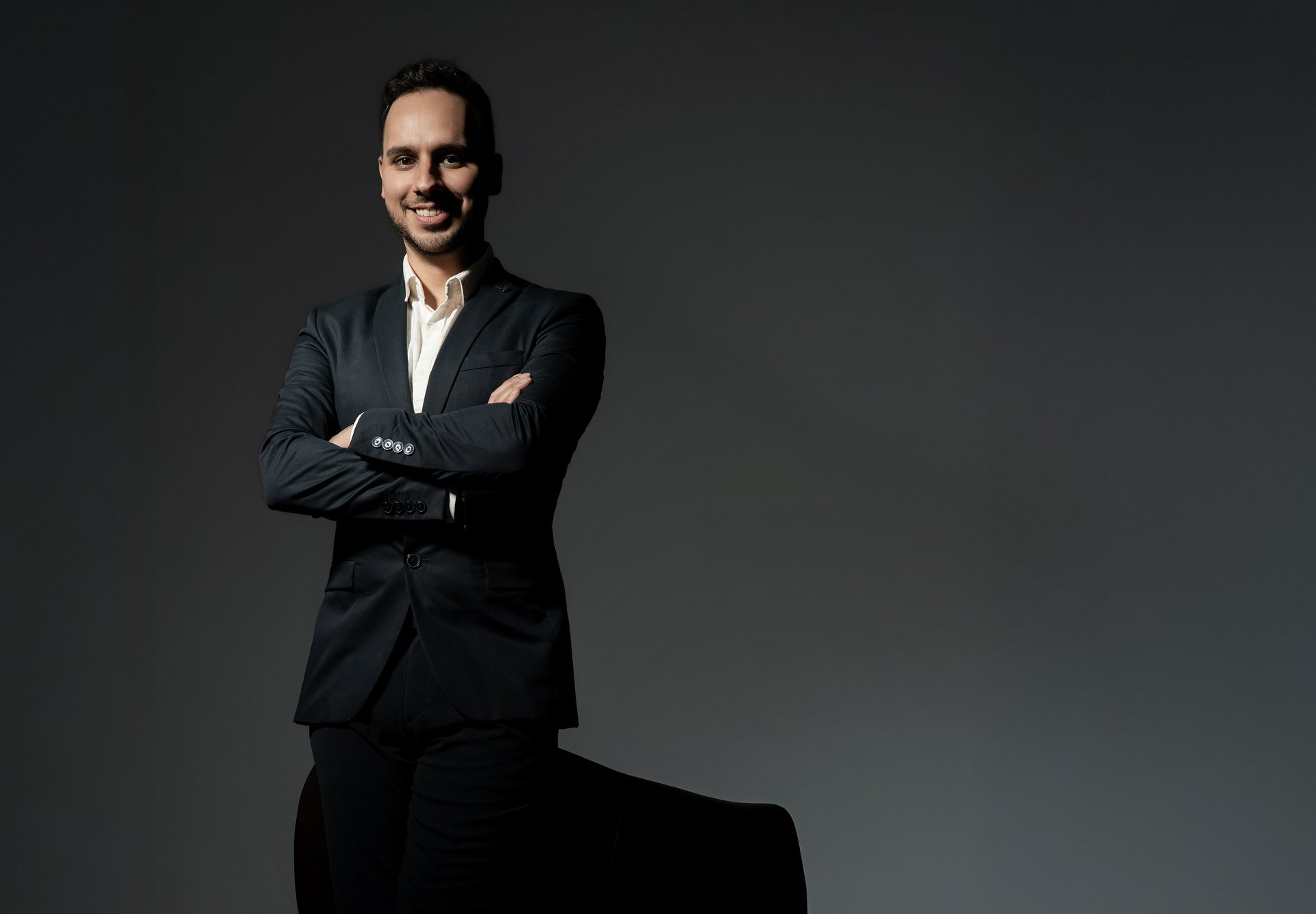 black and brown leather padded tub sofa